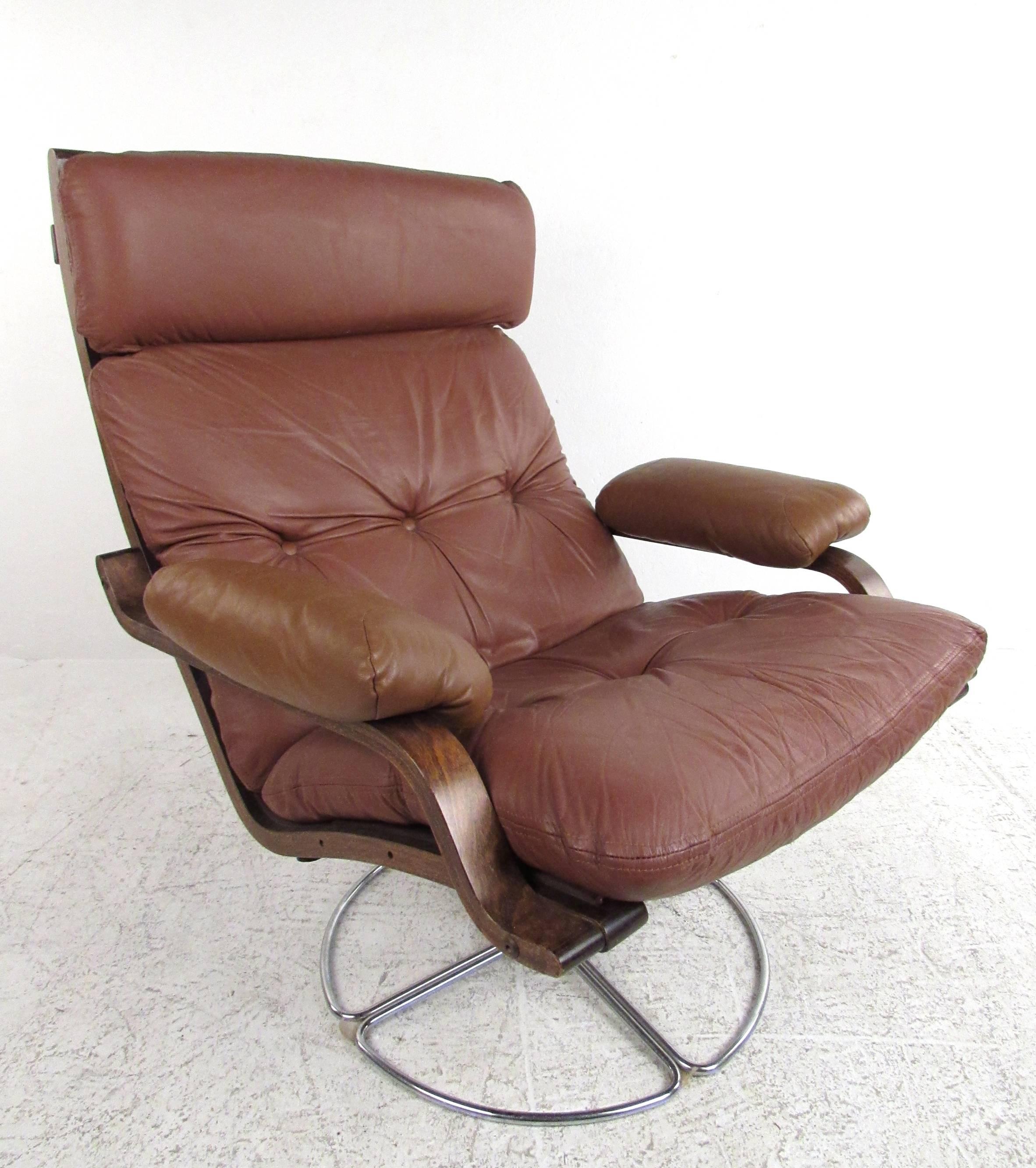 This unique vintage swivel chair features tufted vinyl upholstery, bentwood frame and swivel chrome base. Matching ottoman makes this a versatile seating option for home or office. Please confirm item location (NY or NJ).