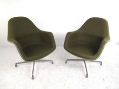 Pair of Mid-Century Herman Miller Swivel Shell Chairs by Charles Eames