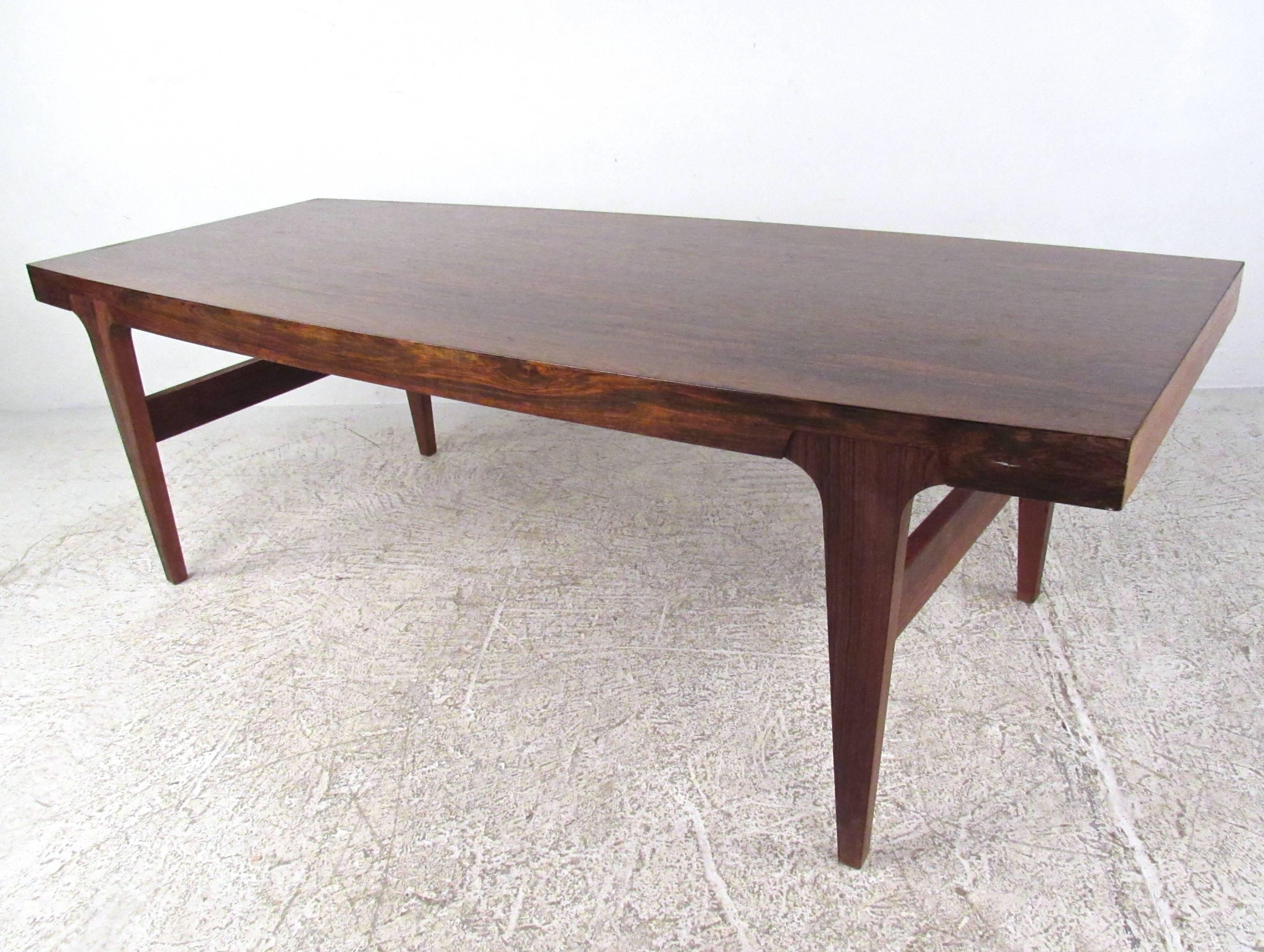 Mid-Century Modern Danish Modern Rosewood Coffee Table in the Style of Johannes Andersen For Sale