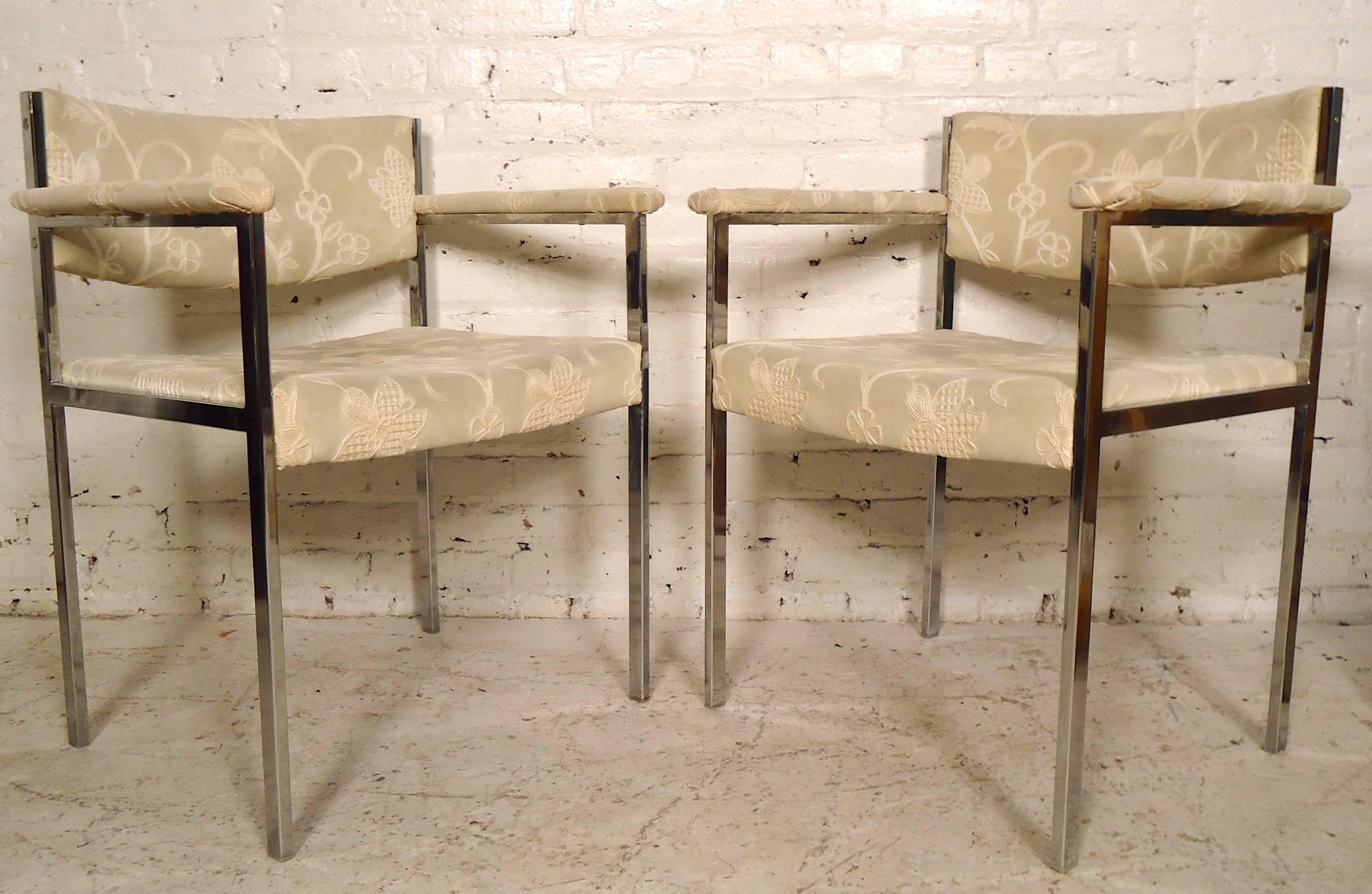 Elegant Mid-Century dining chairs designed by Harvey Probber featuring sleek polished chrome frames. All eight chairs have upholstered seats, backs, and arms.

(Please confirm item location - NY or NJ - with dealer).
 
