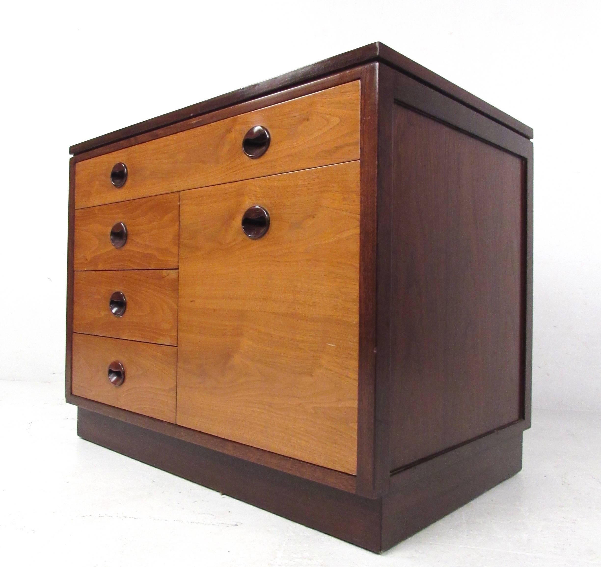 This stylish vintage cabinet features unique banded wood front and plenty of drawer space for organization and storage. Unique pulls, beautiful vintage wood tone and quality craftsmanship make this an ideal storage piece for home or office. Please
