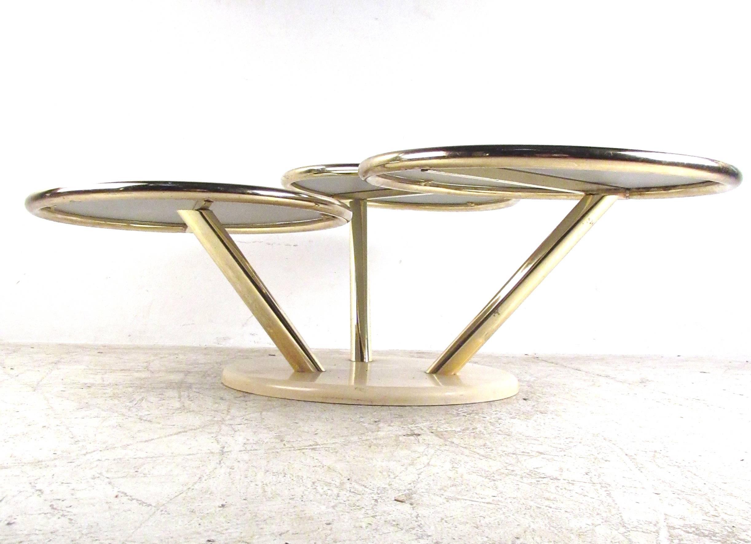 Mid-Century Modern Unique Mid-Century Brass and Glass Swivel Top Coffee Table