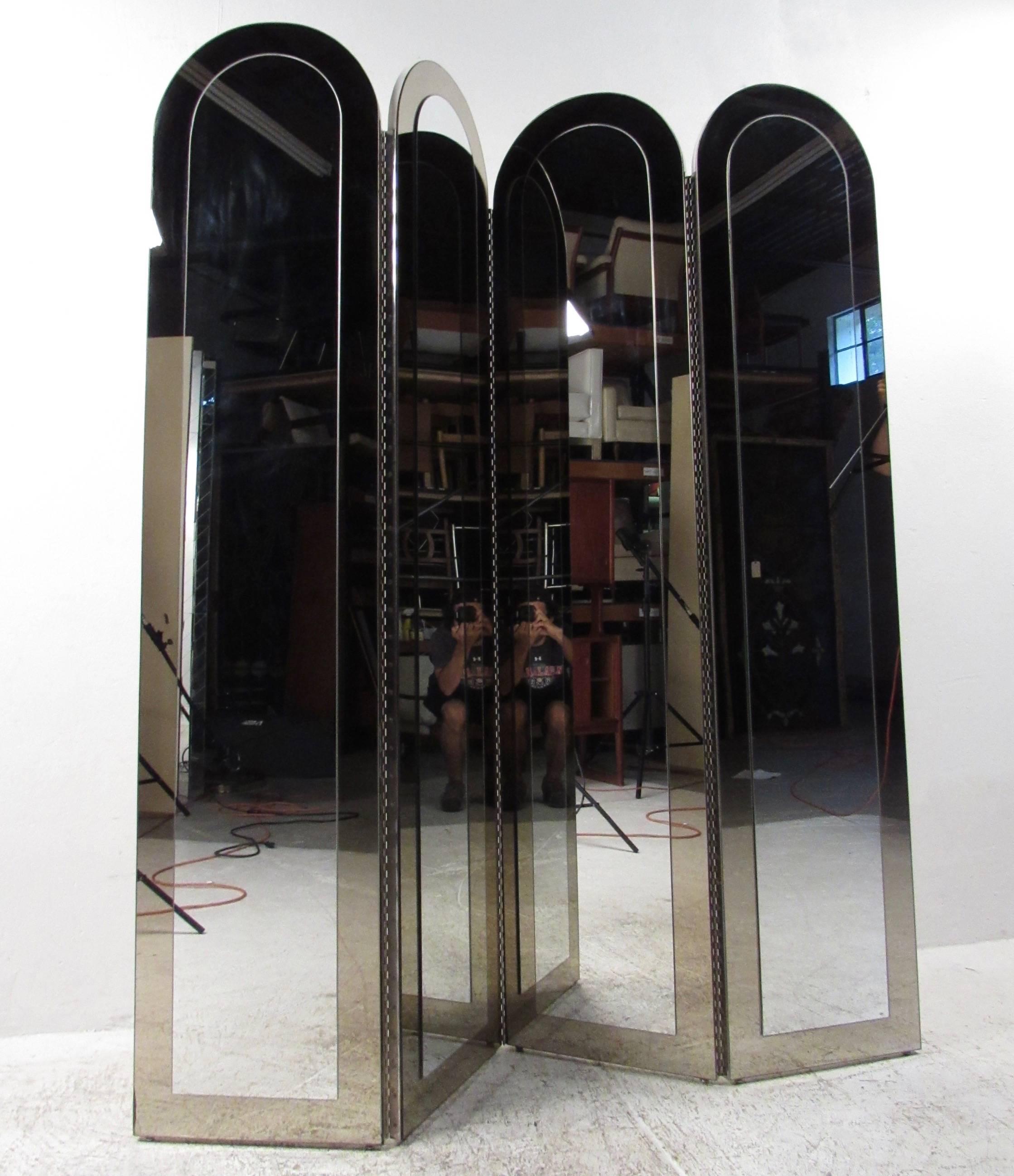 This stunning vintage room divider features tall two-tone mirrored glass panels with unique arched tops. Fold up screen is ideal for home or business use and makes an elegant screen in any setting. Please confirm item location (NY or NJ).