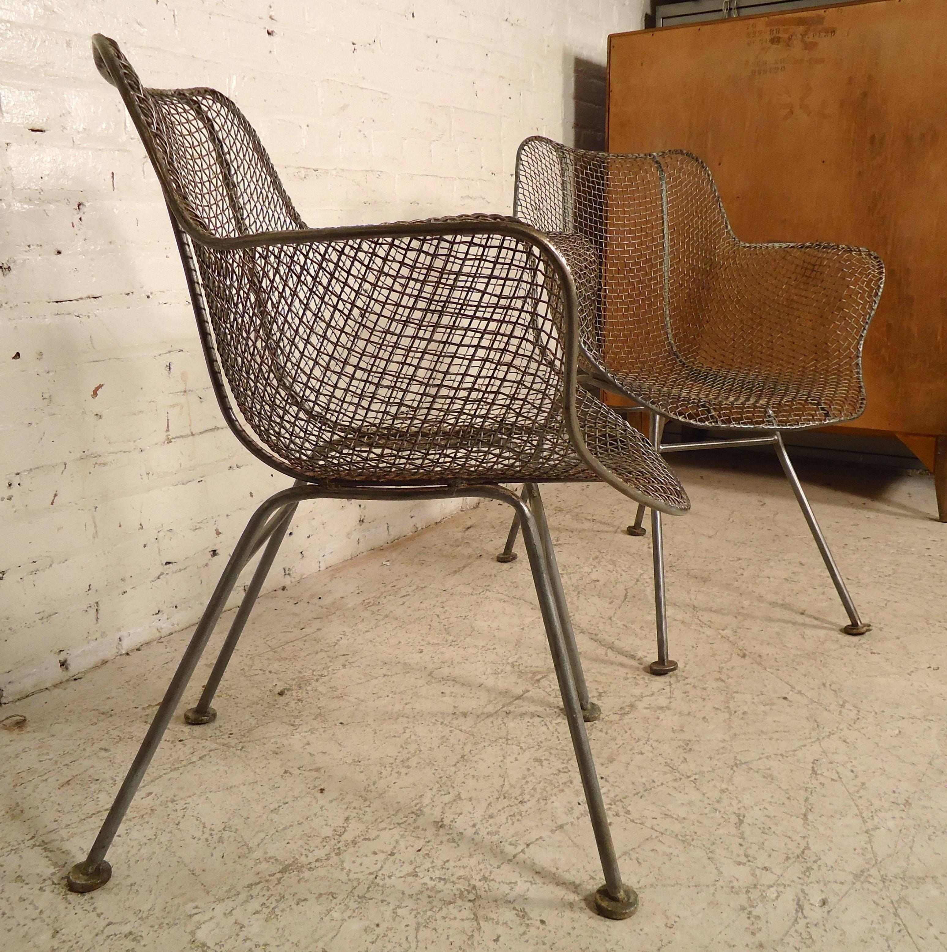 Beautifully sculpted chairs made of woven wrought iron set on strong legs. The form gives support and comfort. These chairs from Russell Woodard go very quickly because of there stylish form and long lasting durability.

(Please confirm item