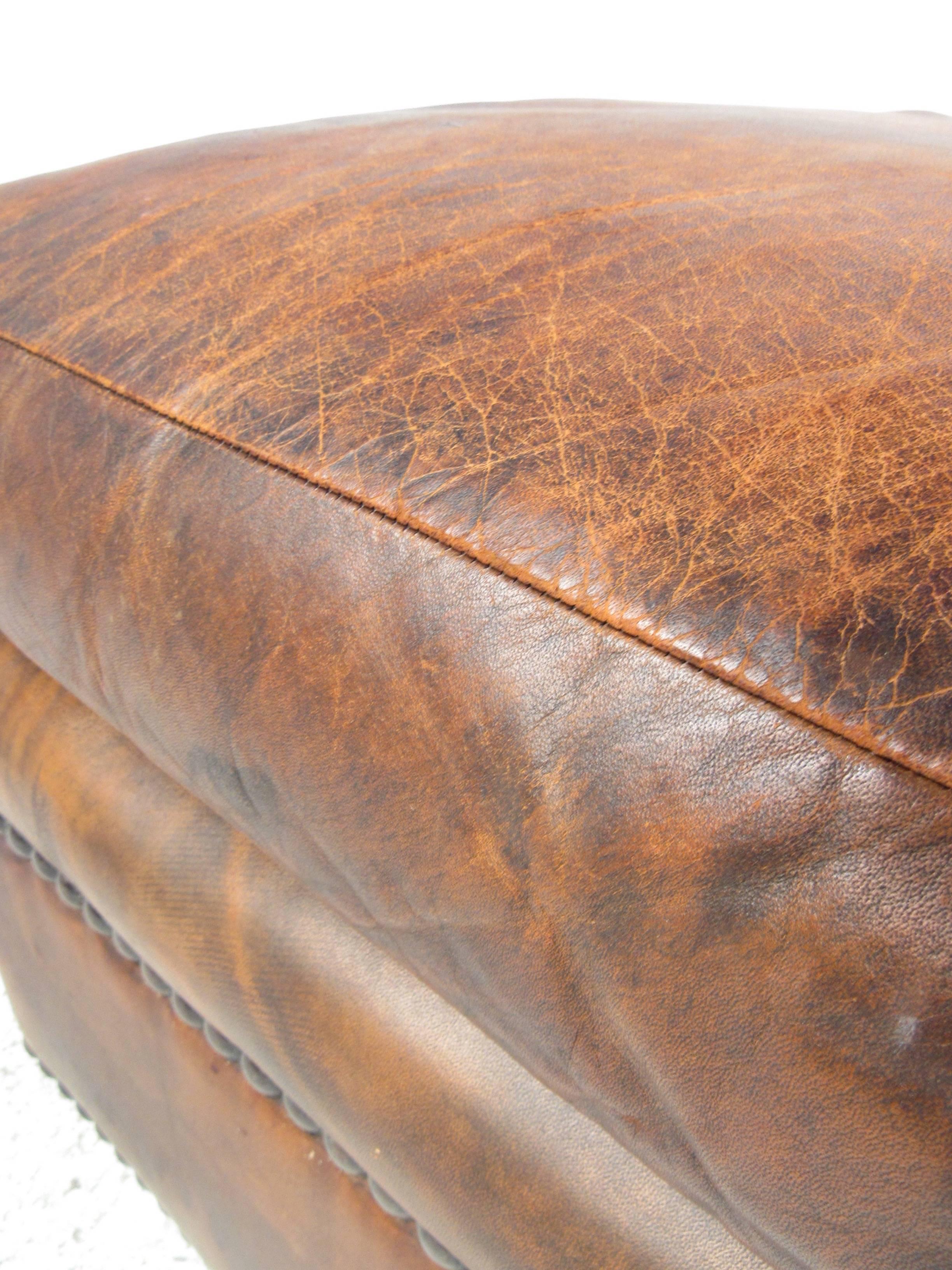 Mid-Century Style Leather Ottoman with Brass Studs In Good Condition In Brooklyn, NY