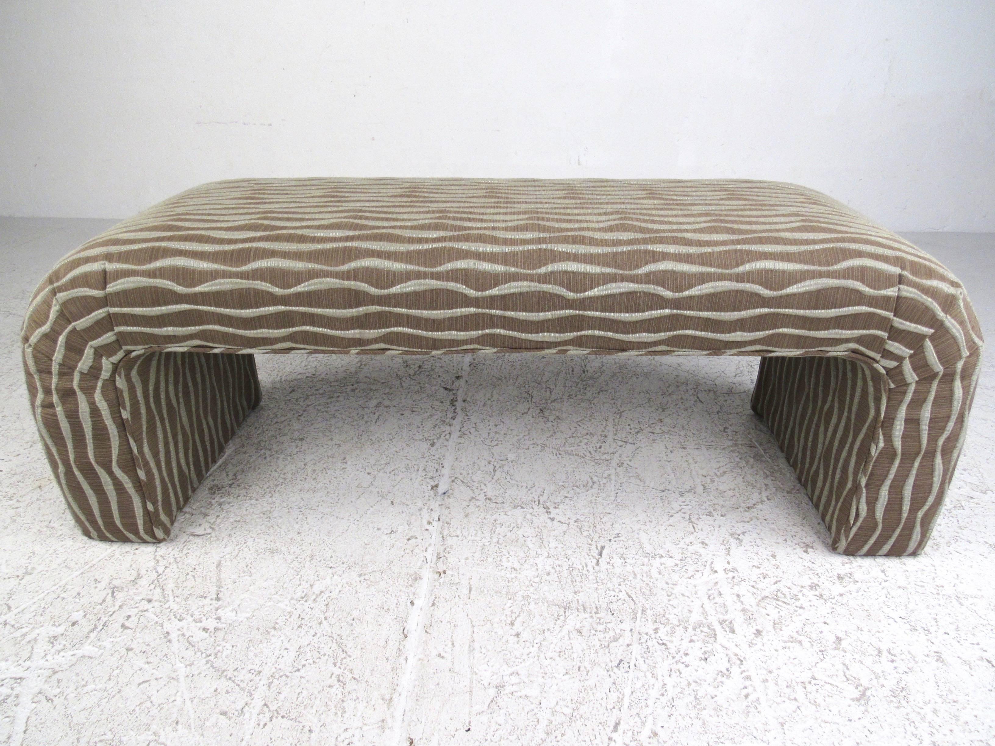 This stylish upholstered window bench is the perfect size for occasional seating in any setting. Unique textured upholstery add some pop to this simple rounded edge bench. This posting is for one bench, one currently available. Please confirm item