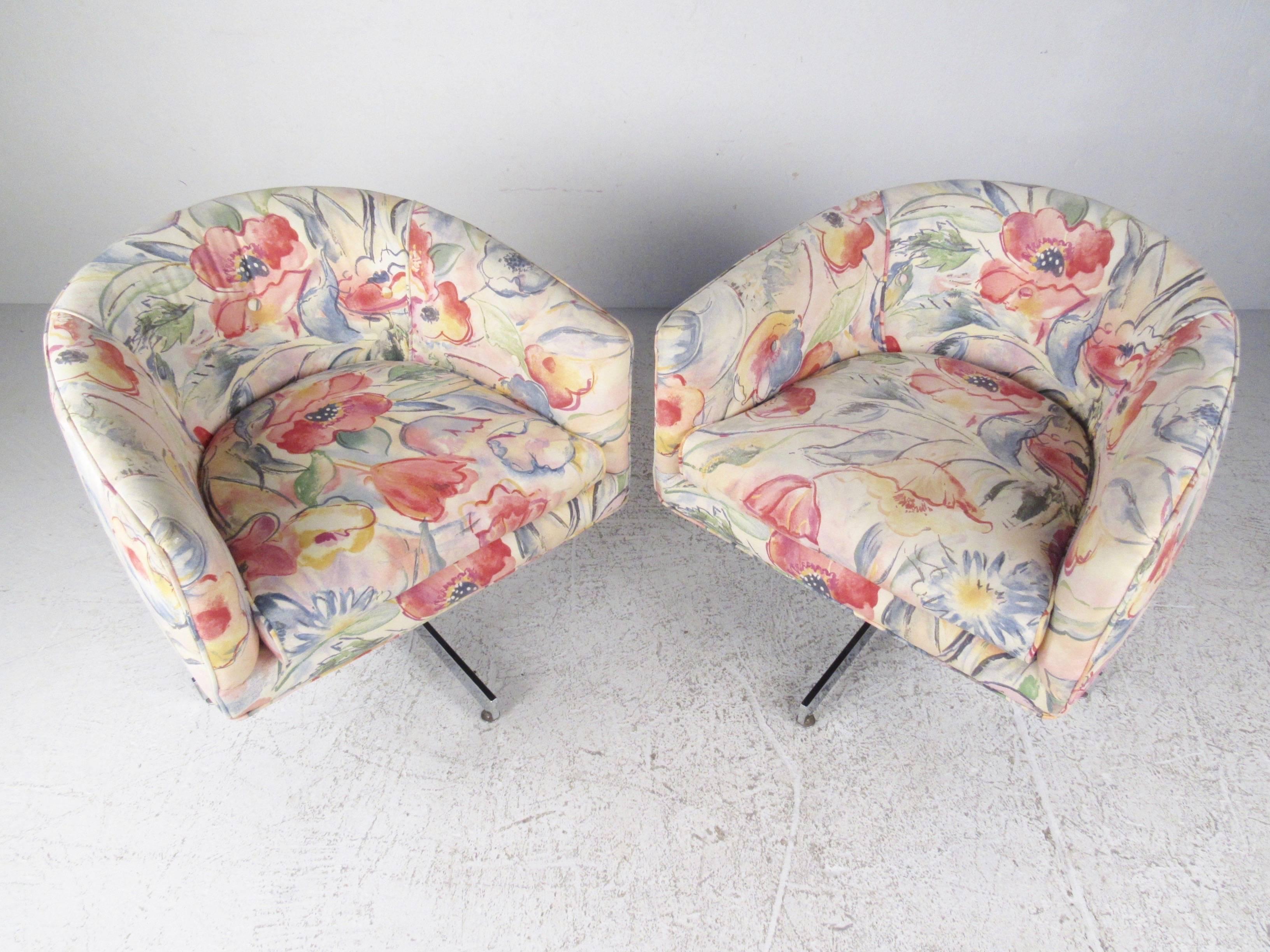 This beautiful pair of vintage swivel club chairs feature the stylish Mid-Century design of Milo Baughman for Thayer Coggin. Unique floral pattern, heavy chrome X bases and comfortable rounded back design make this matching pair an impressive modern