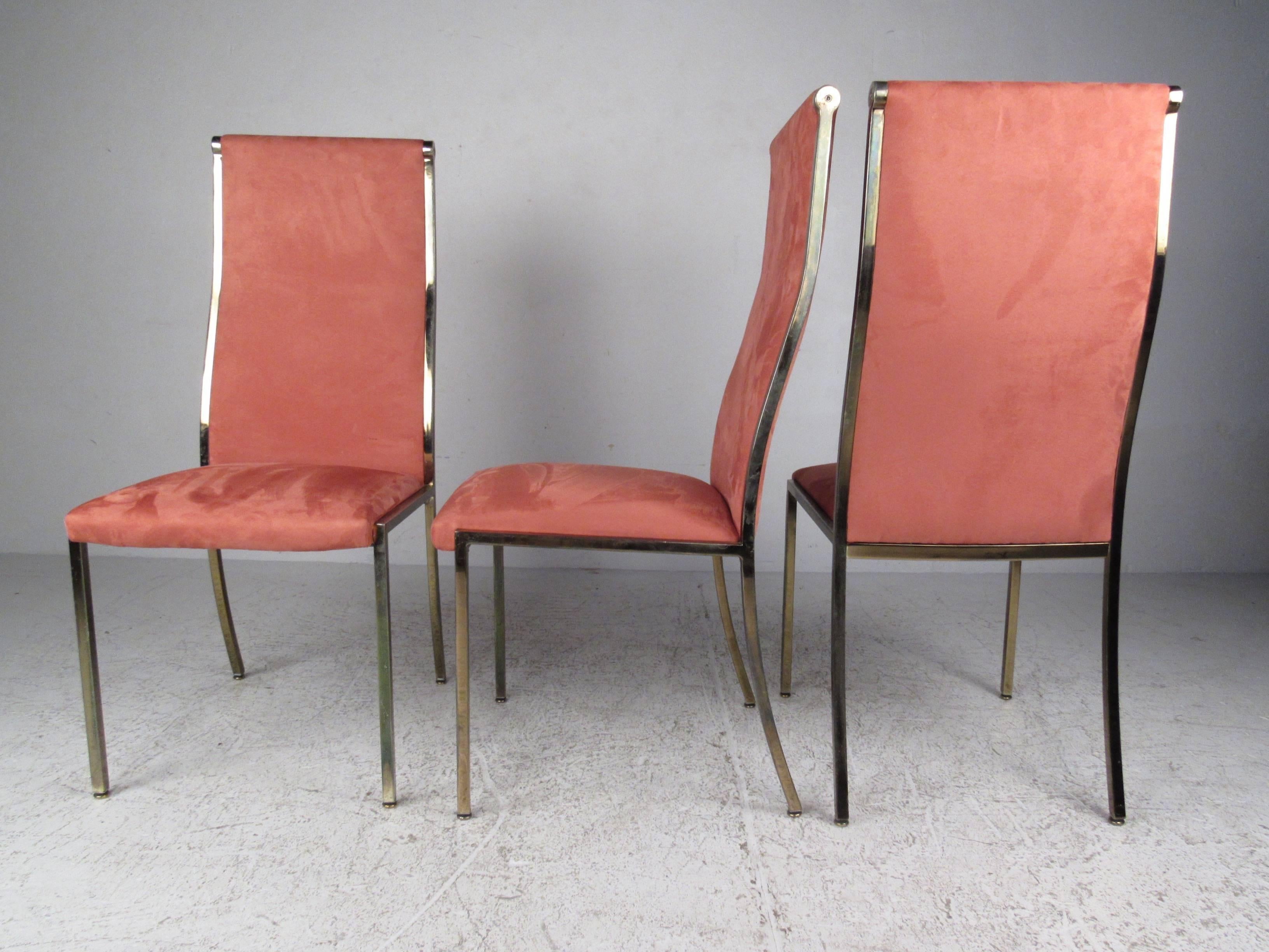 Six Mid-Century Regency style dining chairs with a curving high back. Faux suede upholstery on front and back with a golden brass frame.

(Please confirm item location - NY or NJ - with dealer).
 