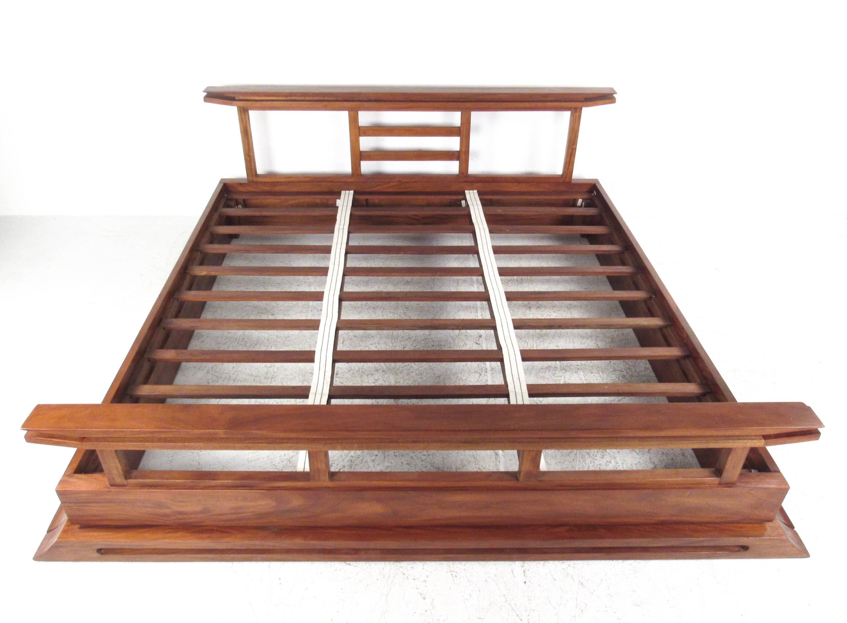 This beautiful asian-influenced teak bed features quality hardwood construction in a wonderfully designed contemporary modern style. Heavy construction includes matching frame with kingsize headboard and foot board, includes slats. Please confirm