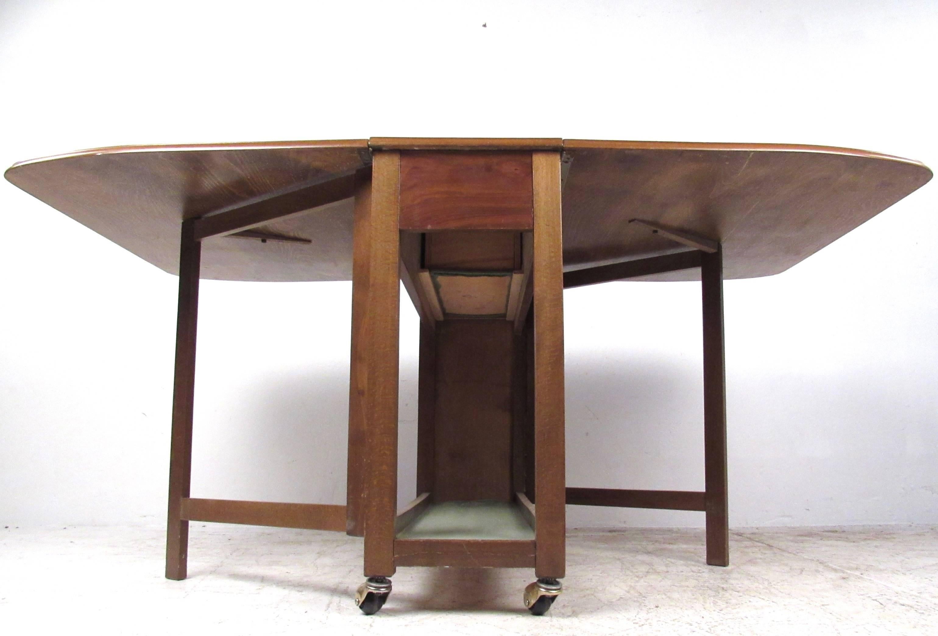 mid century drop leaf table and chairs