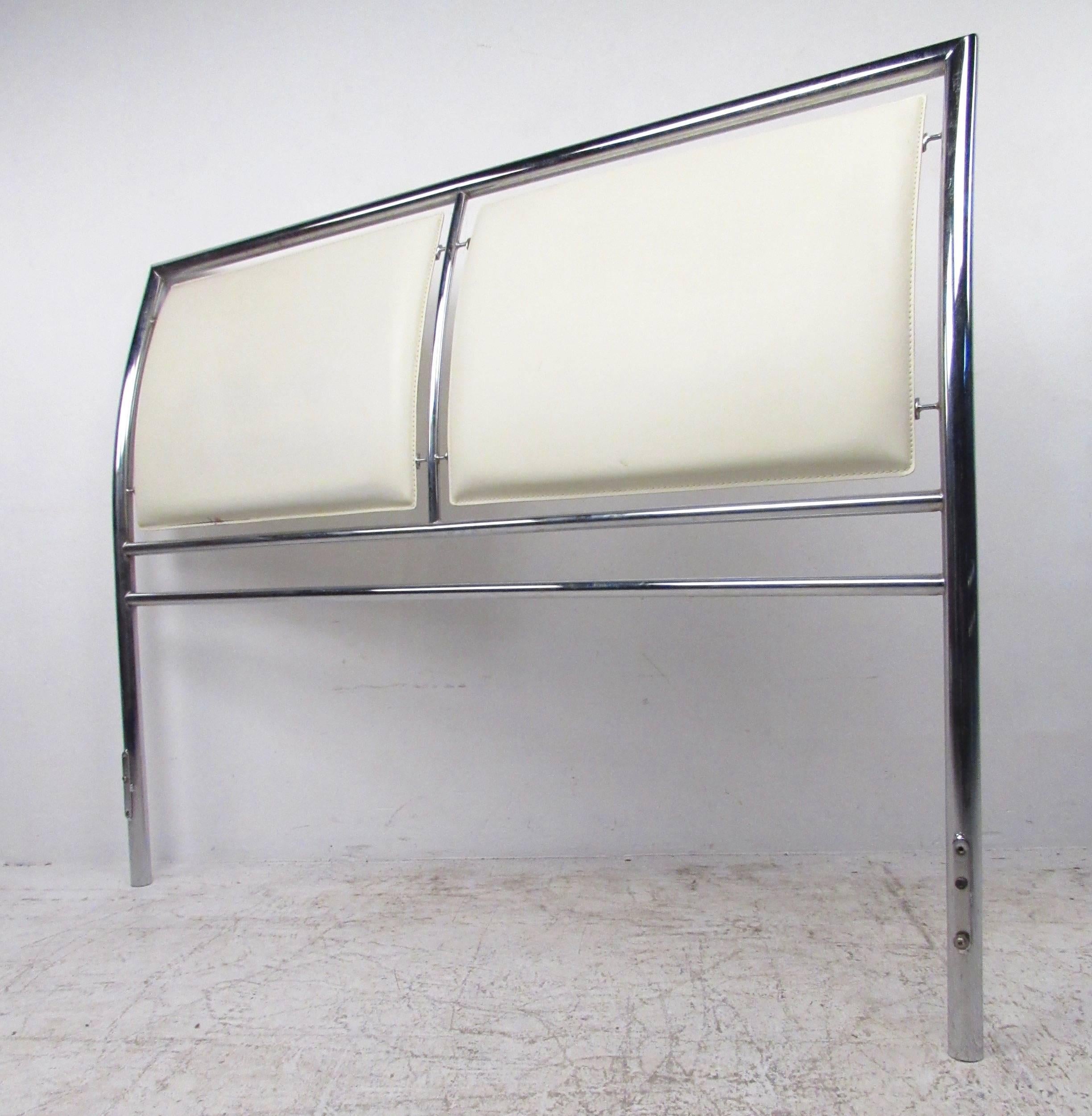 This contemporary vinyl and chrome headboard and footboard feature stylish modern design in a sleek chrome finish. Dual panel upholstered headboard combines style and functionality making a beautiful addition to any bedroom. Please confirm item
