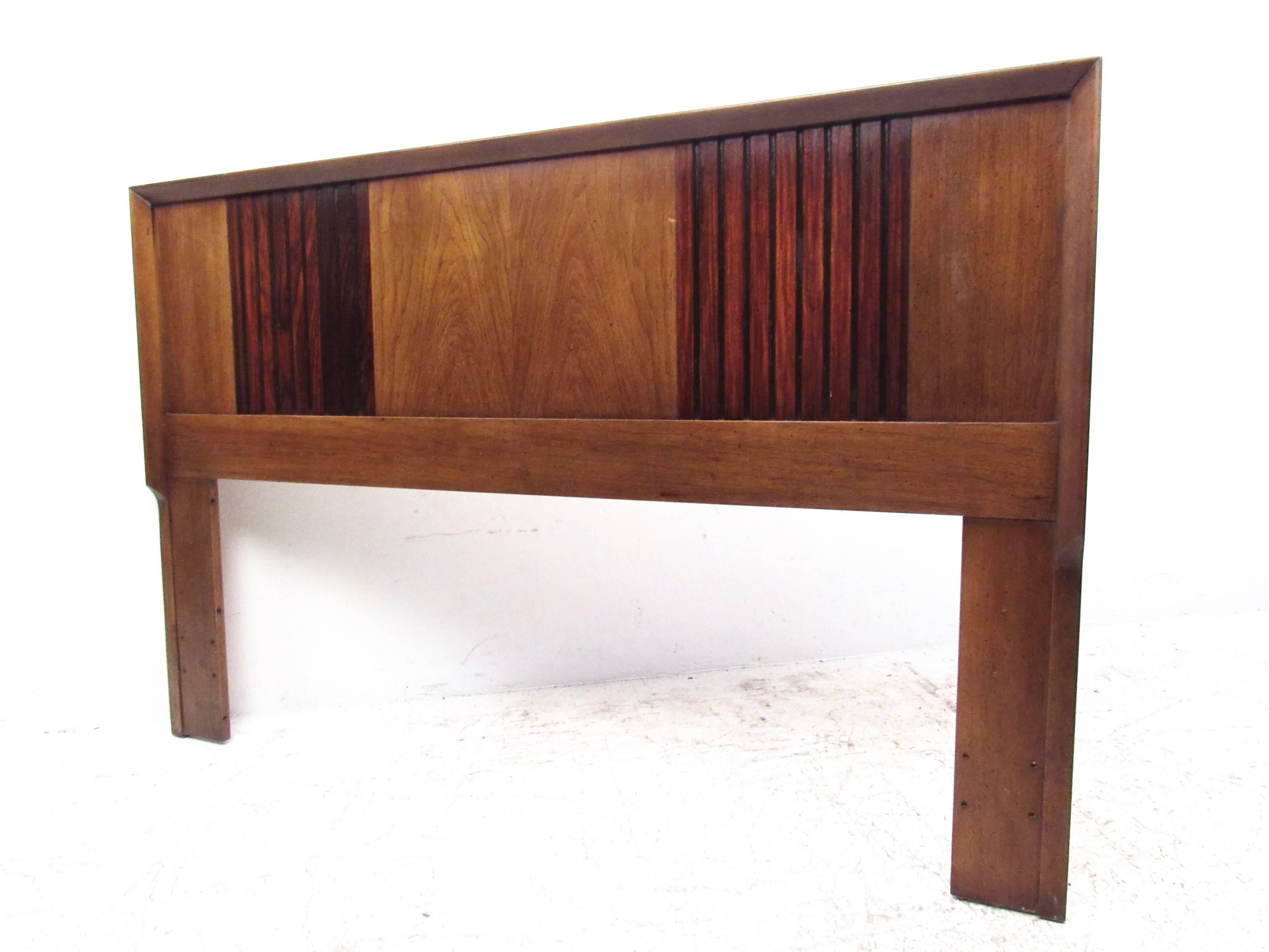 This Mid-Century Modern queen-size headboard features two-tone walnut and rosewood construction with unique sculpted edges. This impressive vintage bed measures 61 W and can be modified to fit your queen-size bed frame. Please confirm item location