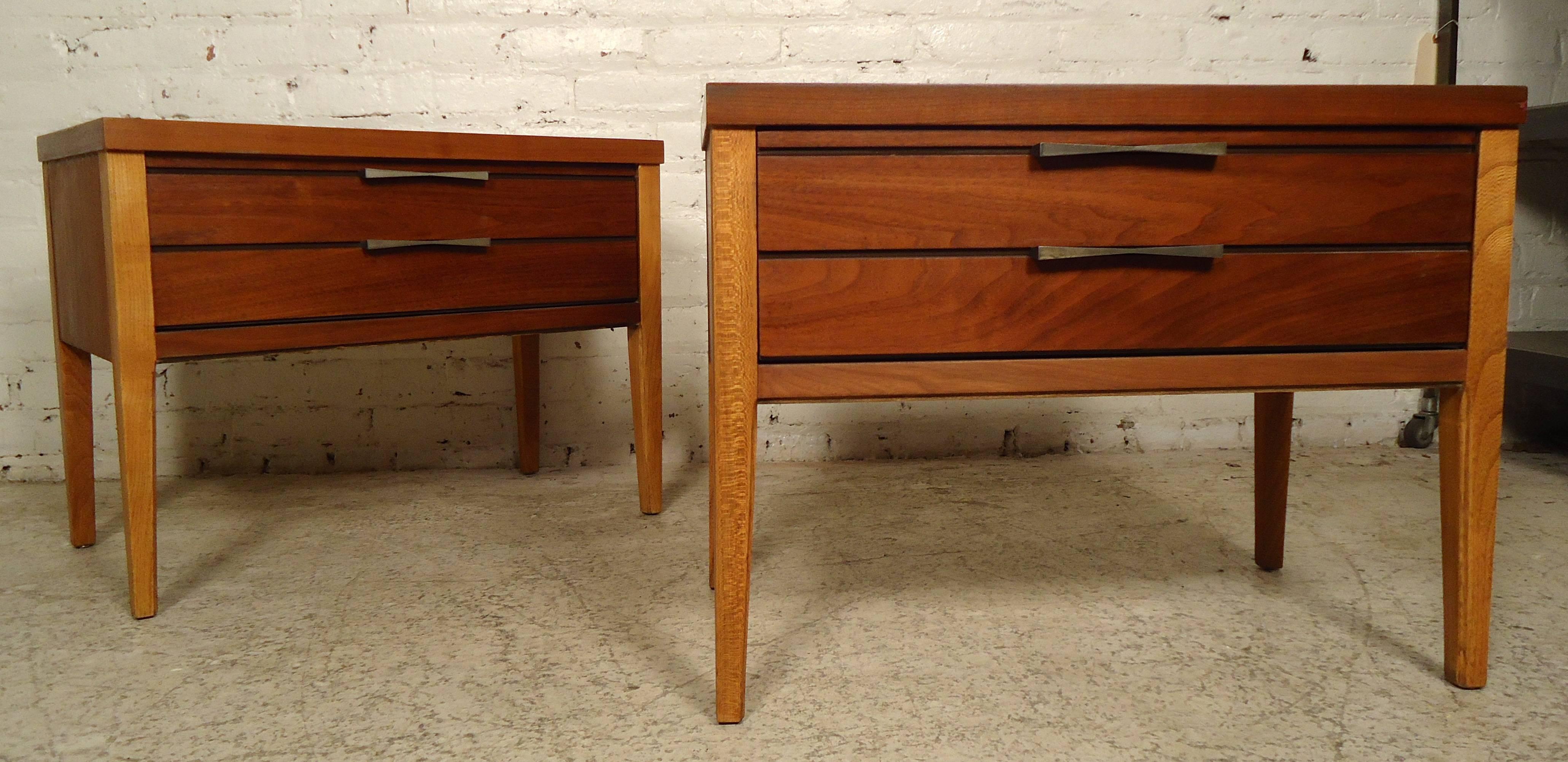 Impressive vintage-modern two-tone nightstands by Lane features an elegant bow tie inlay design on the surface, one drawer with two metallic handles, and sturdy legs.

Please confirm item location (NY or NJ).