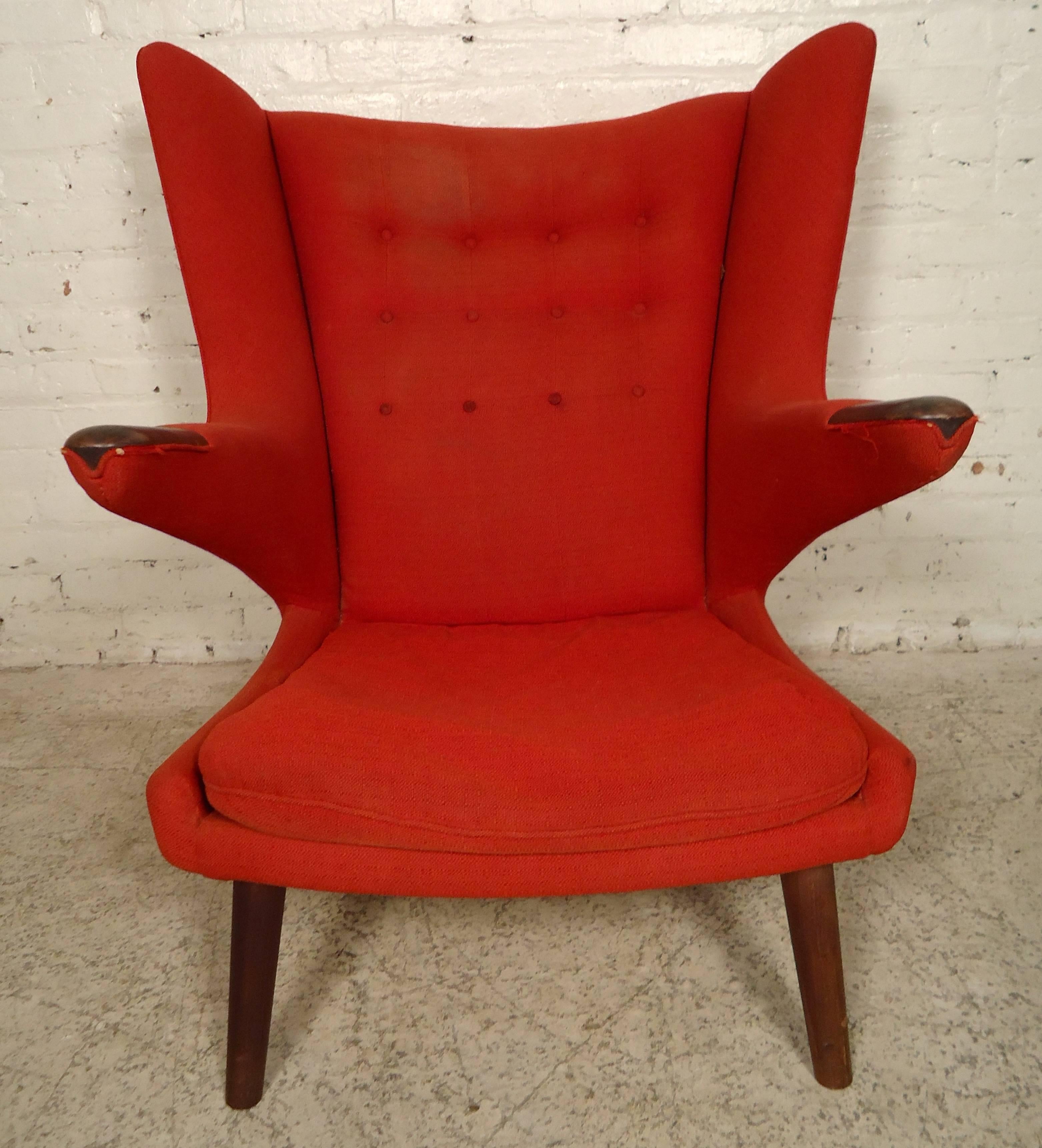 Iconic Hans Wegner Papa Bear chair in red, designed in the 1950s and produced by AP Stolen. This Papa Bear features tipped walnut armrests and a button tufted seat back making this cozy reading/lounge chair standout. 

Please confirm item location