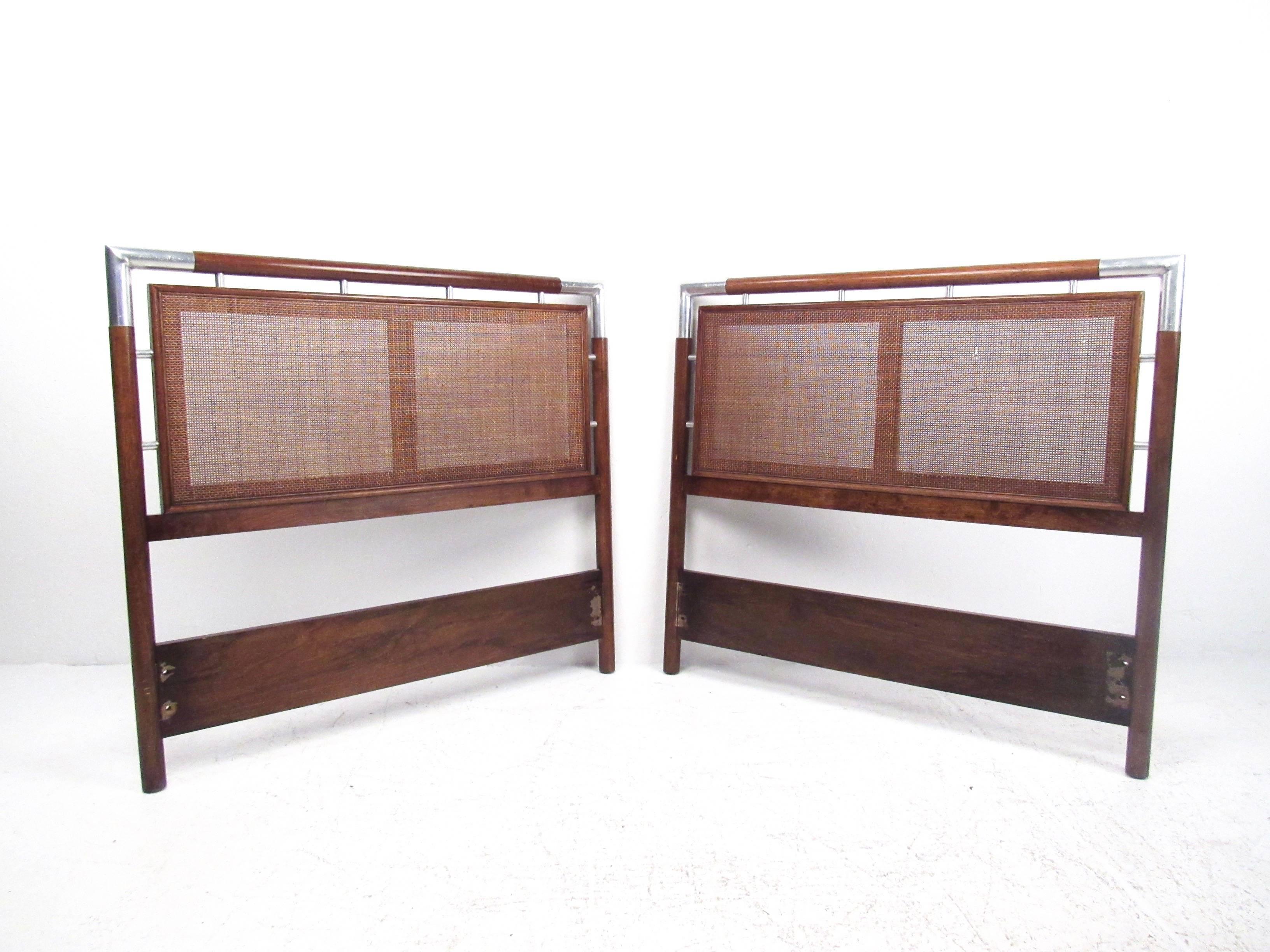 This vintage modern pair of headboards features a unique Mid-Century design with woven cane and chrome details. Can be used for a pair of children's beds or as a 