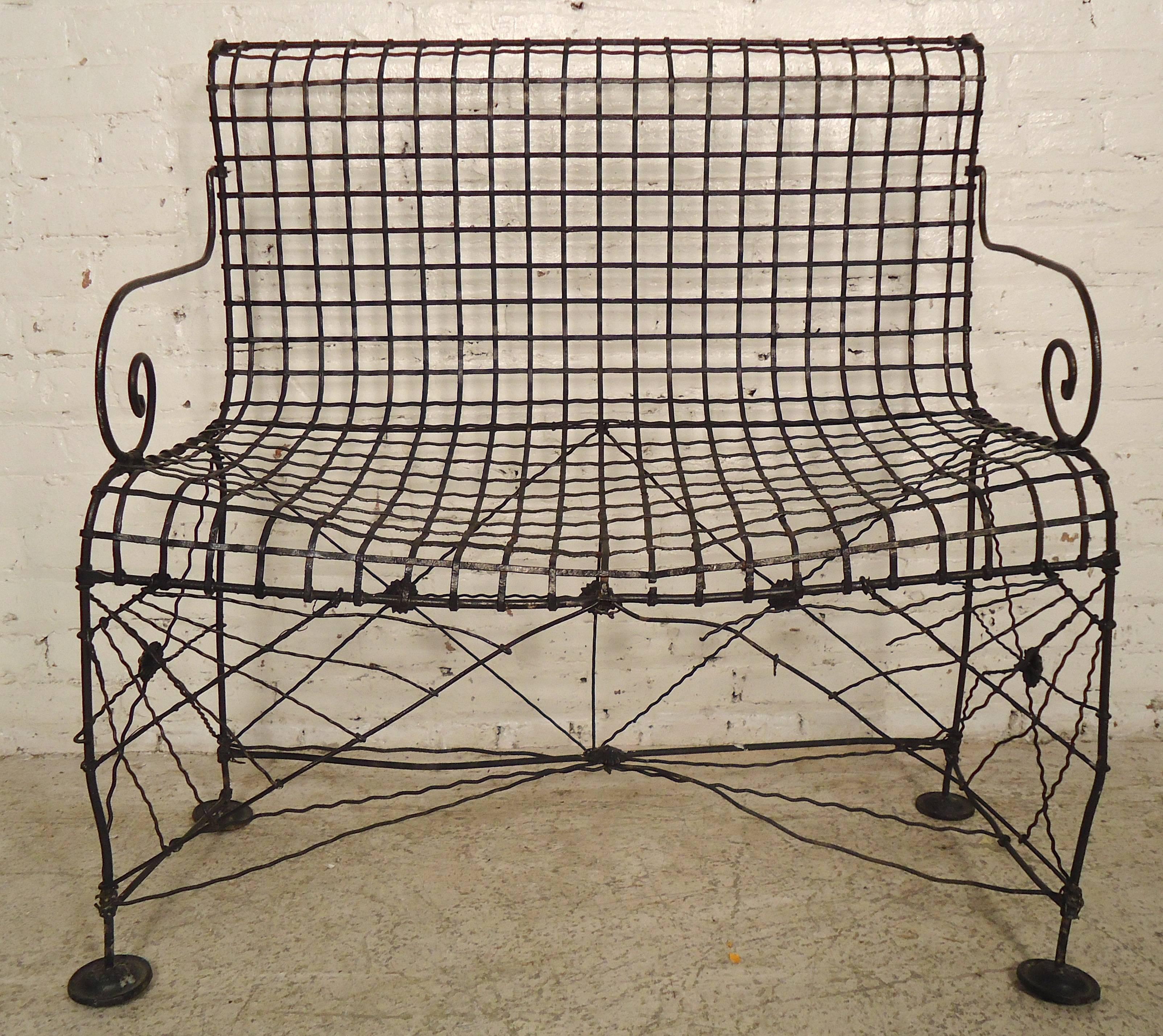 Attractive petite iron bench with scrolled arms and webbed base. Great as lawn furniture.
Measures: Seat height 17