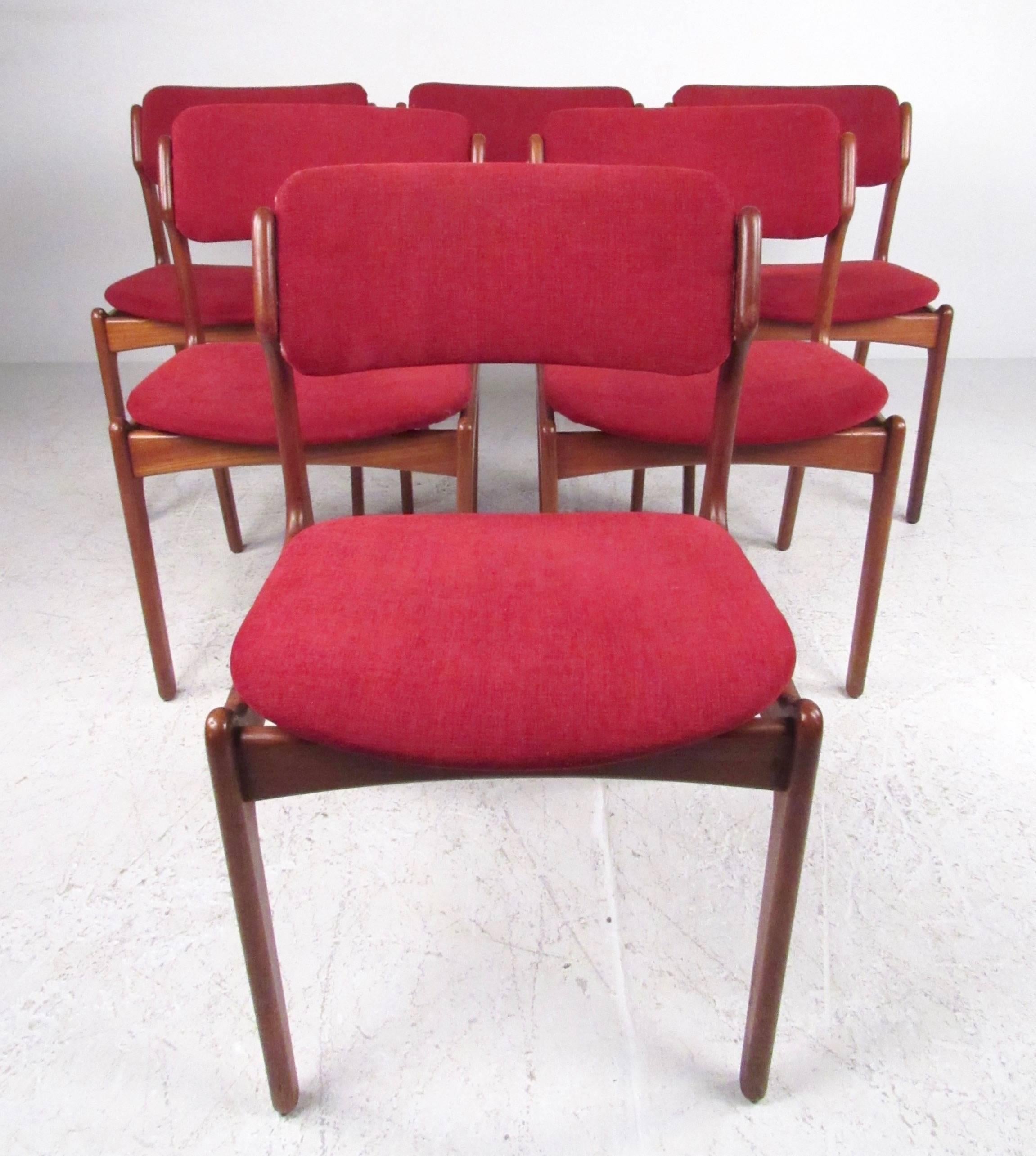 This set of six teak dining chairs by O.D Mobler features the stylish mid-century design of Erik Buch, and makes a stunning addition to any dining set. Floating seats, sculpted teak frames, and upholstered angled seat backs add to the comfort of