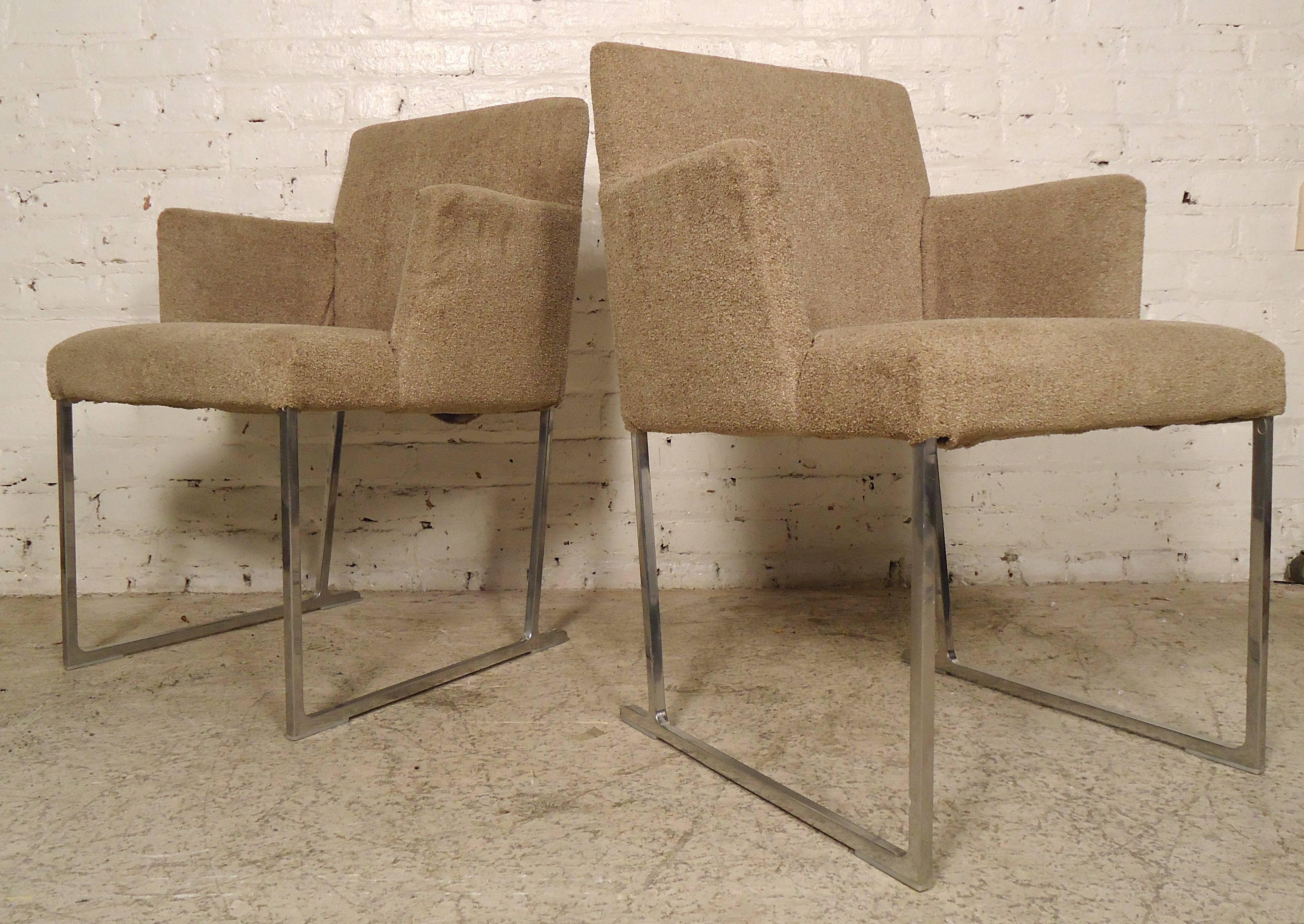 Sleek Mid-Century style chairs with aluminium sled legs. Handsome simple modern lines throughout. 

(Please confirm item location NY or NJ with dealer).
 