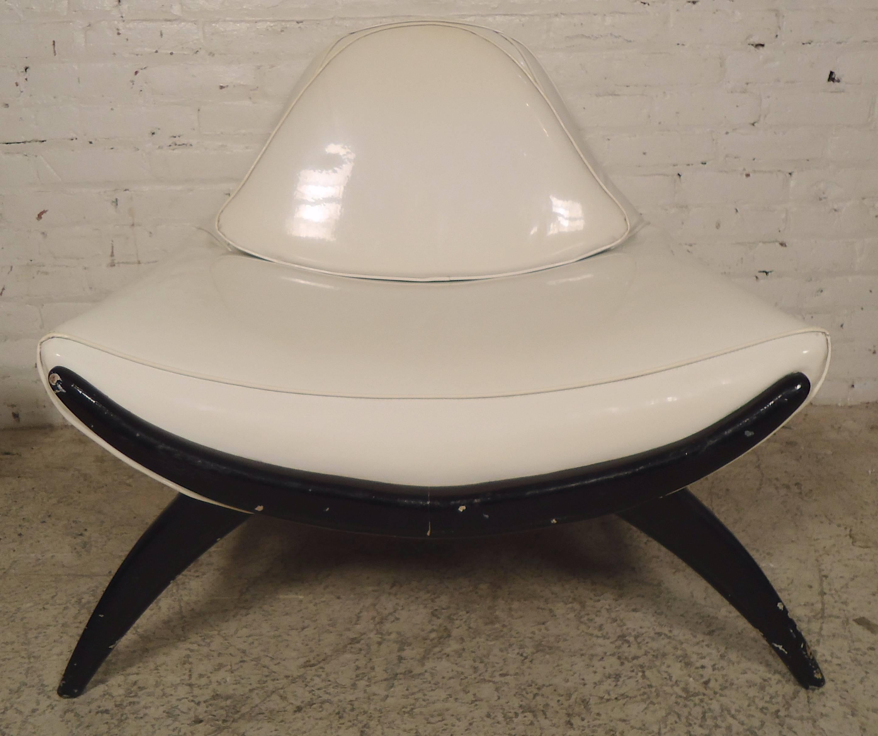 Super 1960s style designed by Adrian Pearsall with wide seating and large ottoman. Black sculpted frames and white vinyl upholstery.

(Please confirm item location NY or NJ with dealer).
                       