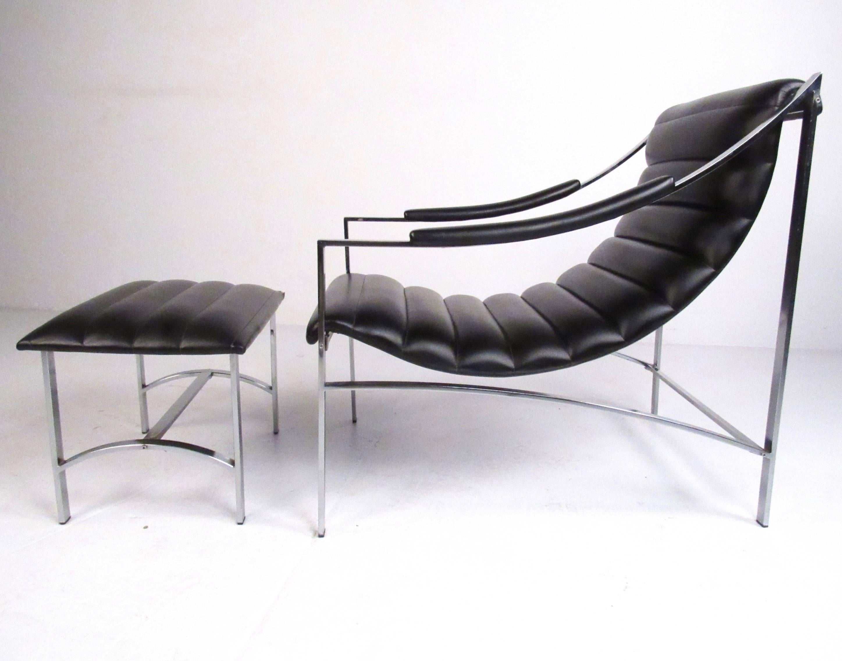 This stylish vintage lounge chair features ribbed vinyl upholstery and sleek chrome frame. Uniquely shaped armrests offer upholstered padding, while the Mid-Century style of the piece echoes Italian modern sensibilities. Please confirm item location