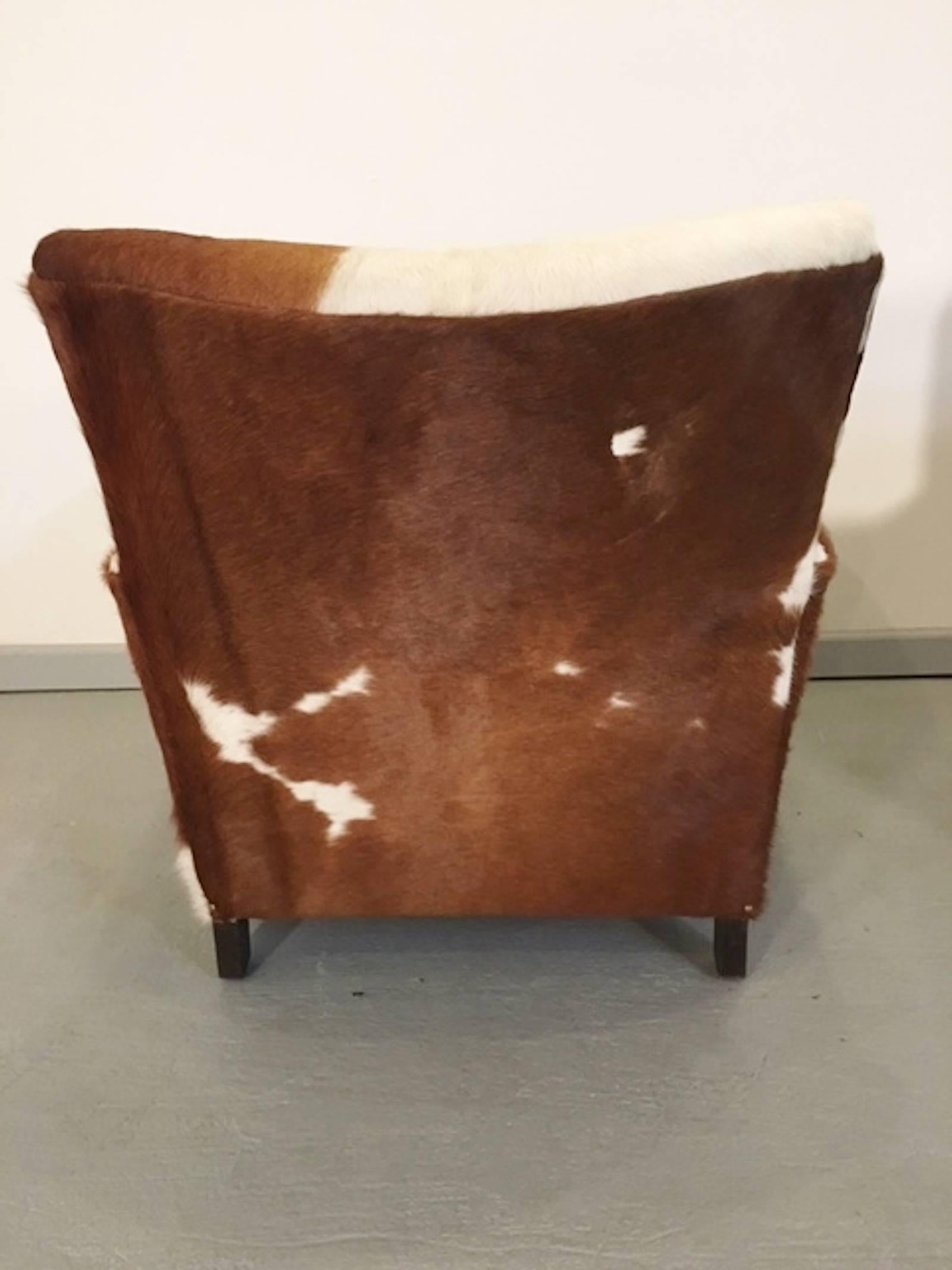 Mid-20th Century Pair of Unique French Smoking Chairs in Stunning Cowhide