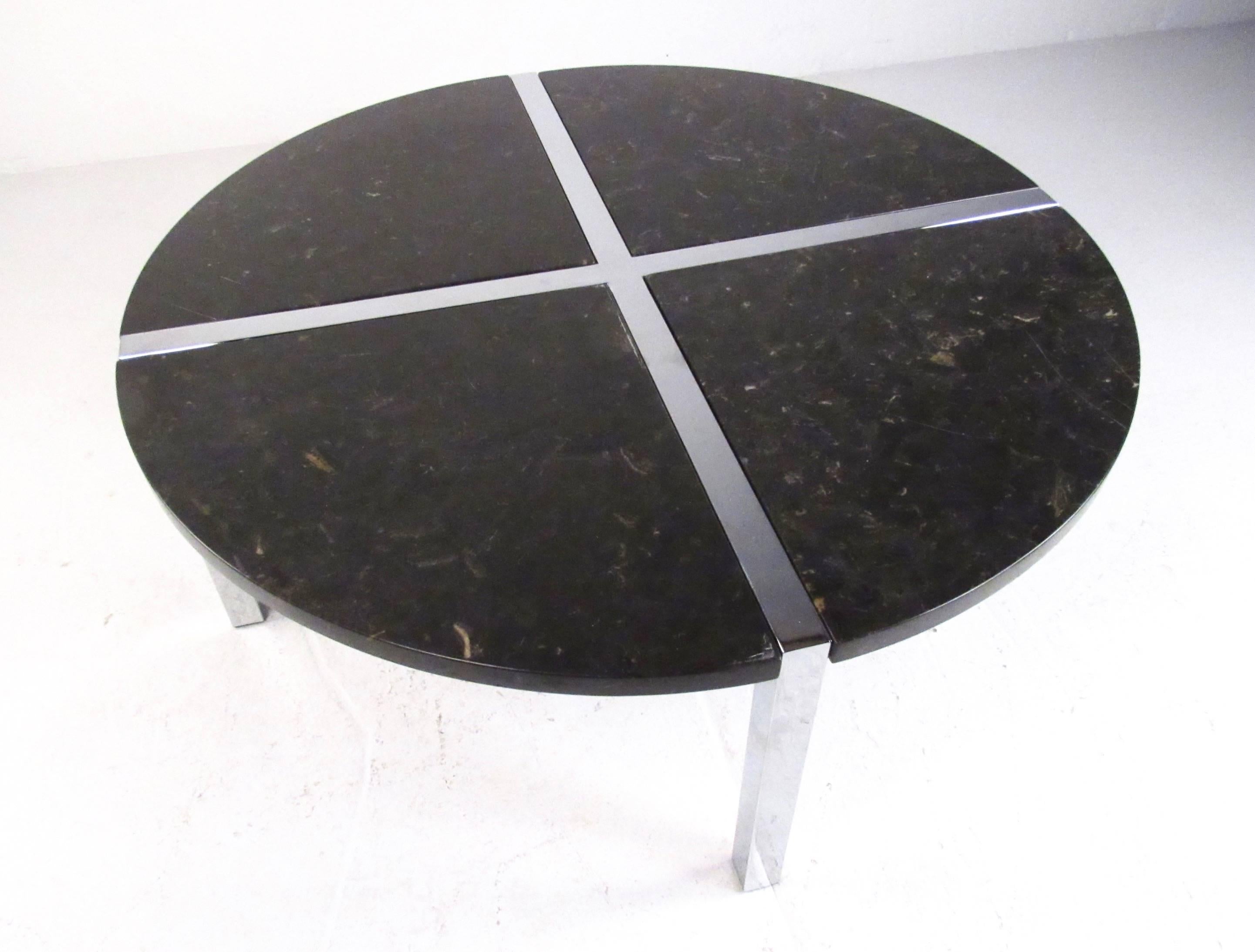 This two tone modern chrome coffee table features sturdy construction and consists of chrome frame with marble slab tops. Stylish circular table makes an impressive centrepiece to any seating area, home or business. Please confirm item location (NY