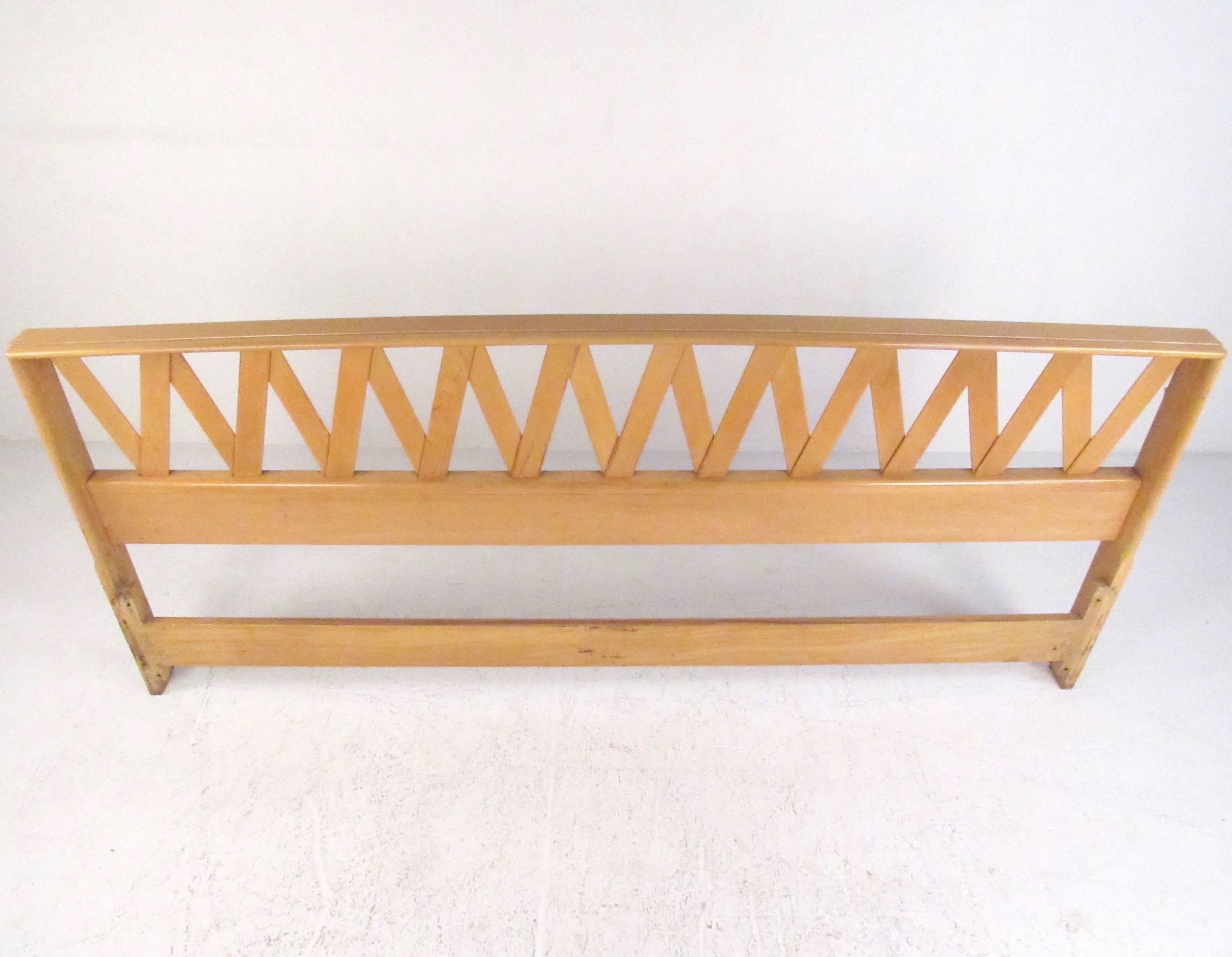 This vintage king-size headboard features the stylish Mid-Century design of Paul Frankl for Johnson furniture. The sculptural design adds unique modern appeal to any bedroom. Please confirm item location (NY or NJ).
