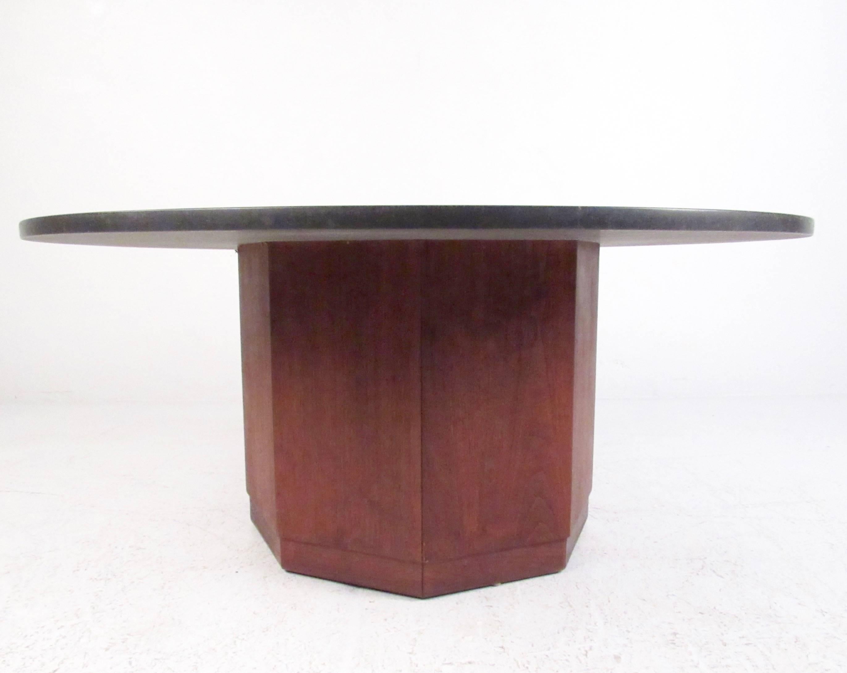 This stylish octangular coffee table base features natural walnut finish with a circular slate top. Mid-Century Modern design makes this a beautiful addition to home or workplace, please confirm item location (NY or NJ). 