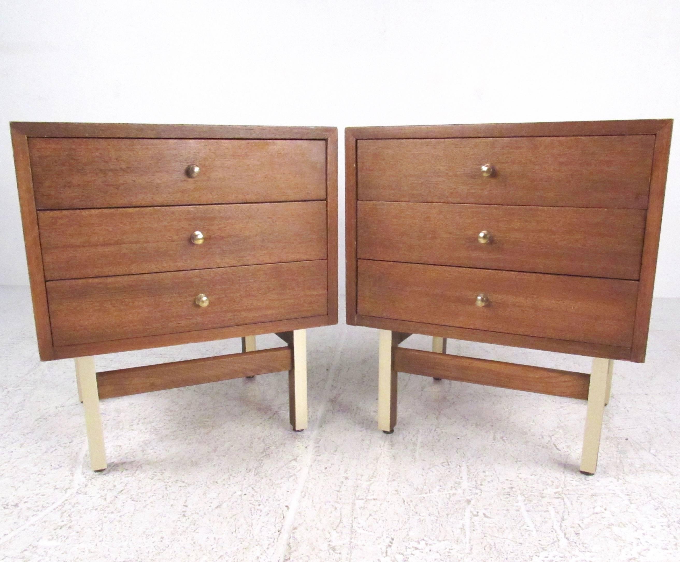 These stylish pair of Mid-Century bedside table’s features spacious three-drawer storage with dovetails construction, brass handles and unique aluminium trims. The vintage natural finish adds a wonderful vintage accent to any interior, from bedroom