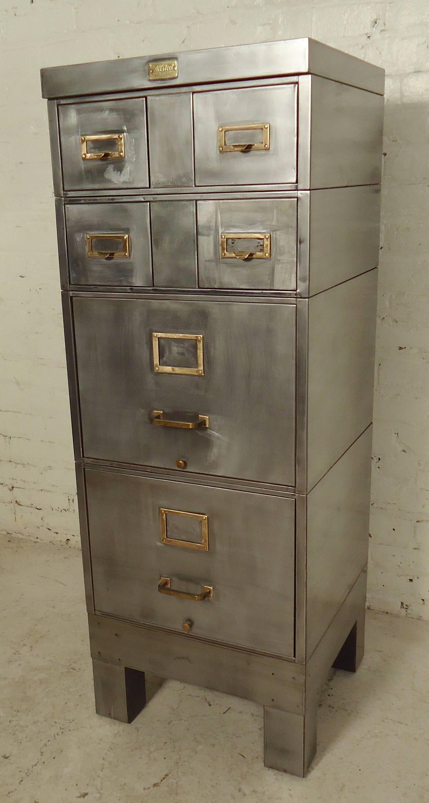 Super Industrial style filing cabinet with four cabinets stacked on a base and topper. Accenting brass hardware and allsteel logo plate.

(Please confirm item location - NY or NJ - with dealer).
  
