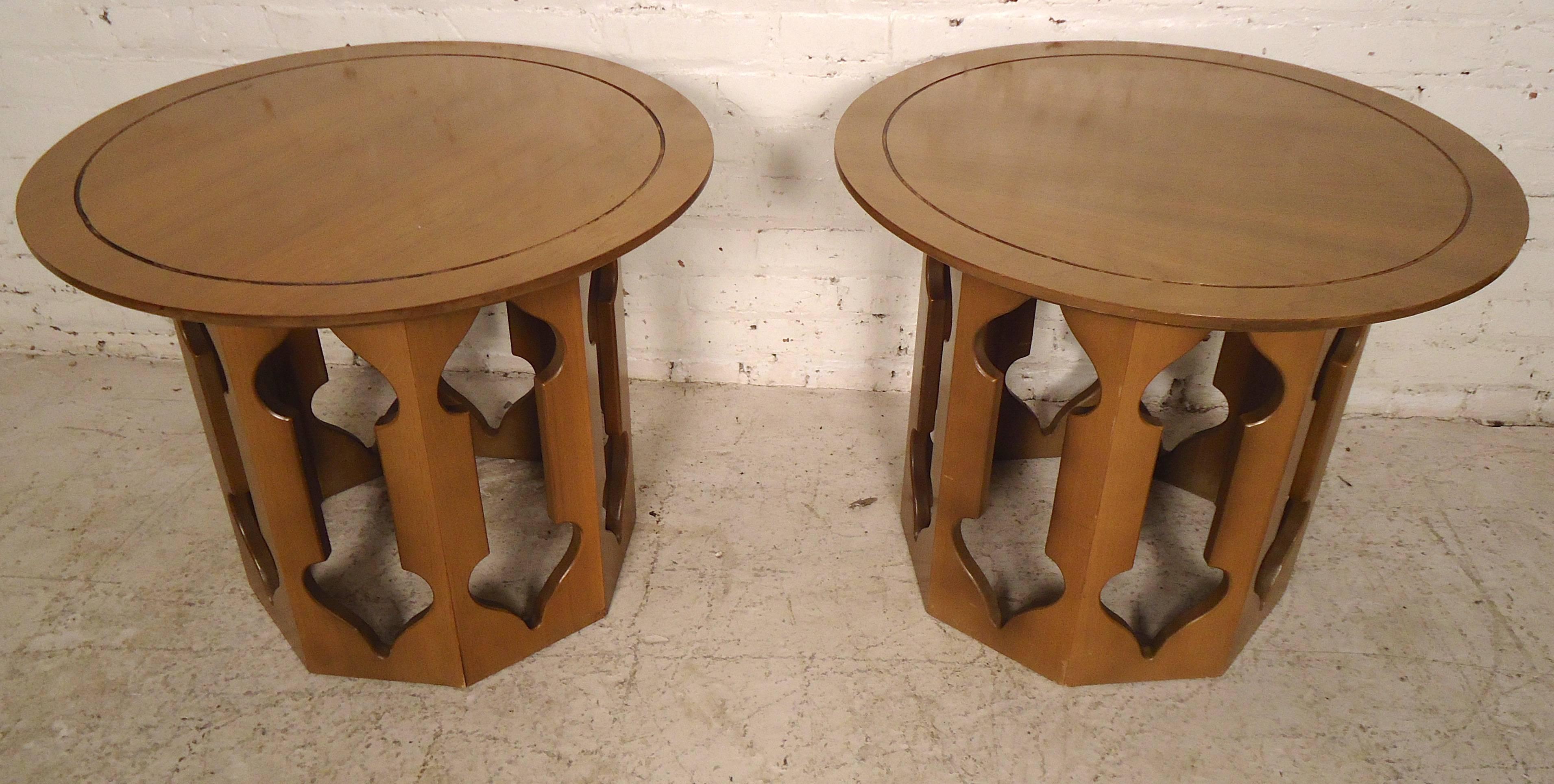 Pair of end tables with round top and sculpted bases in a Harvey Probber style. 

(Please confirm item location - NY or NJ - with dealer).
 