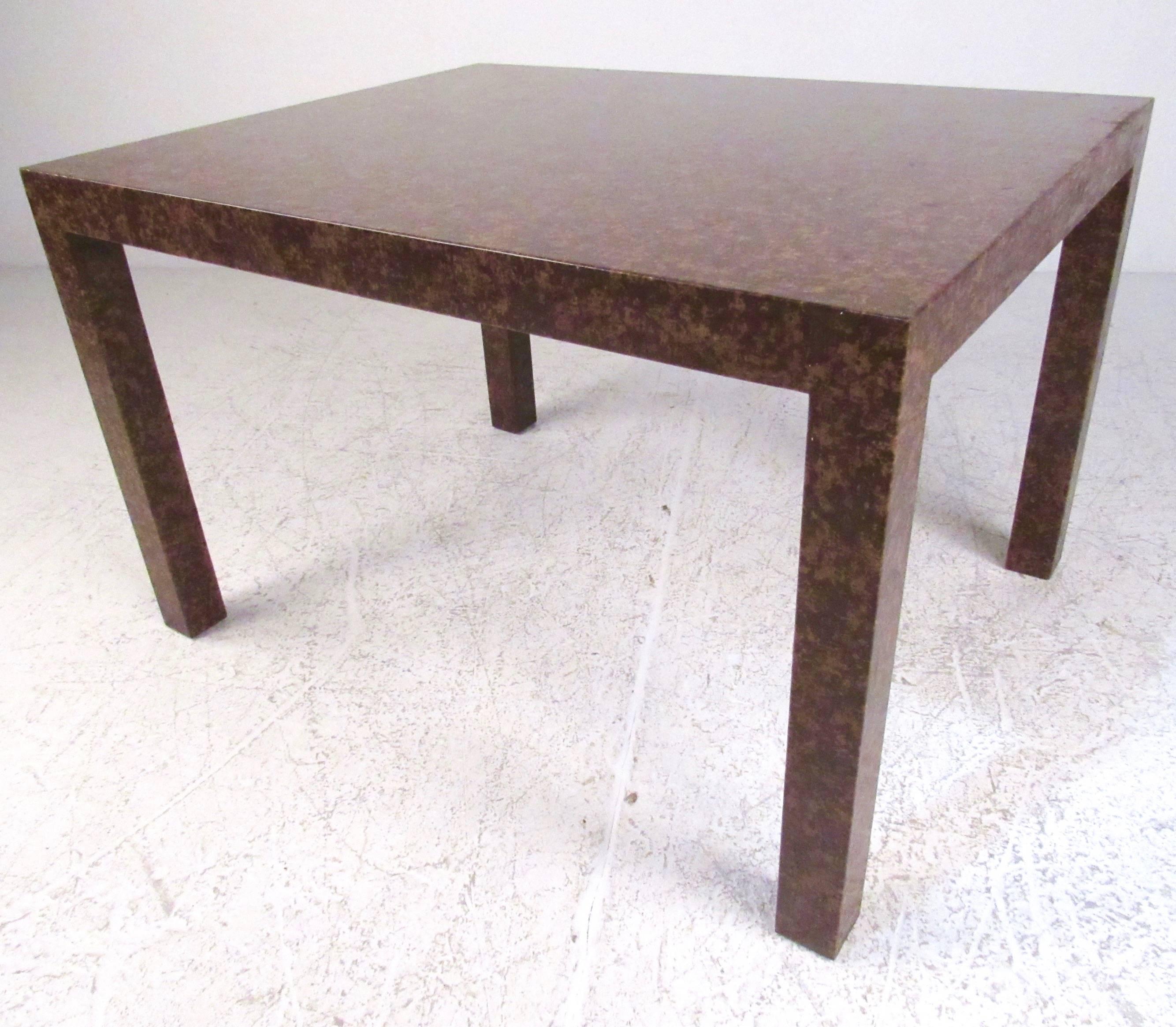 This unique oil-spot lacquered side table features a unique burl-like finish with mid-century modern style design similar to Edward Wormley for Dunbar. Second similar side table (ten inches smaller) also available, please confirm item location (NY