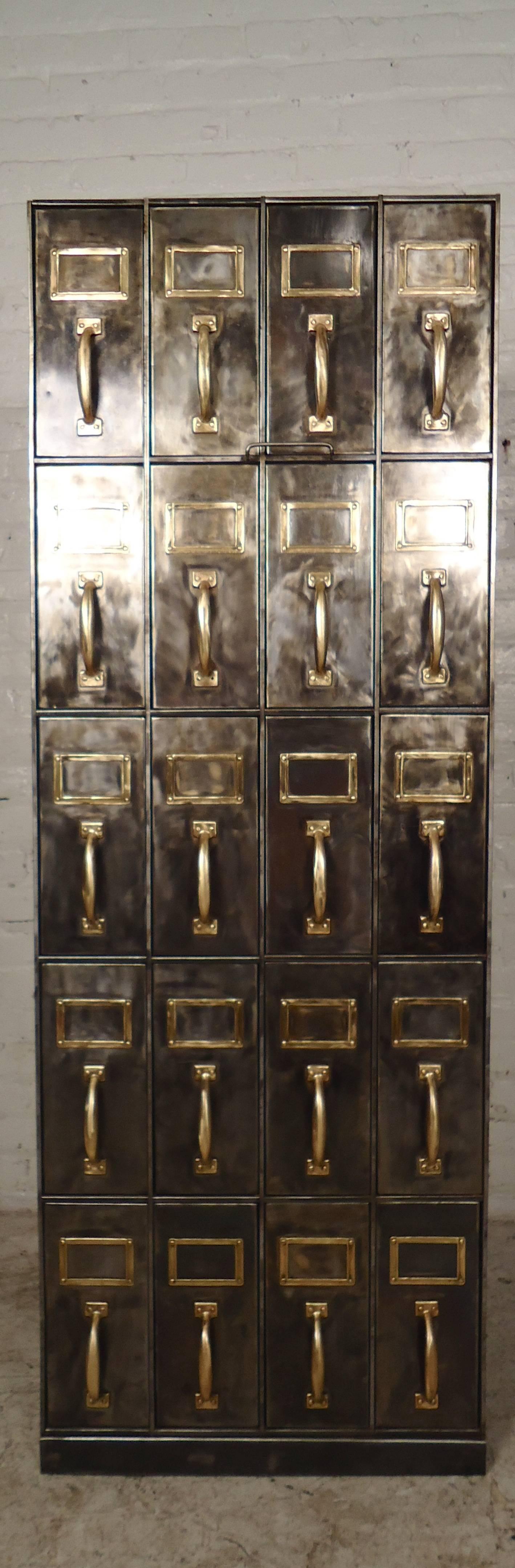 Vintage metal file cabinet restored in a bare style finish. Great Industrial look with brass handles and name plates to accent the silver finish.

(Please confirm item location, NY or NJ, with dealer).
 