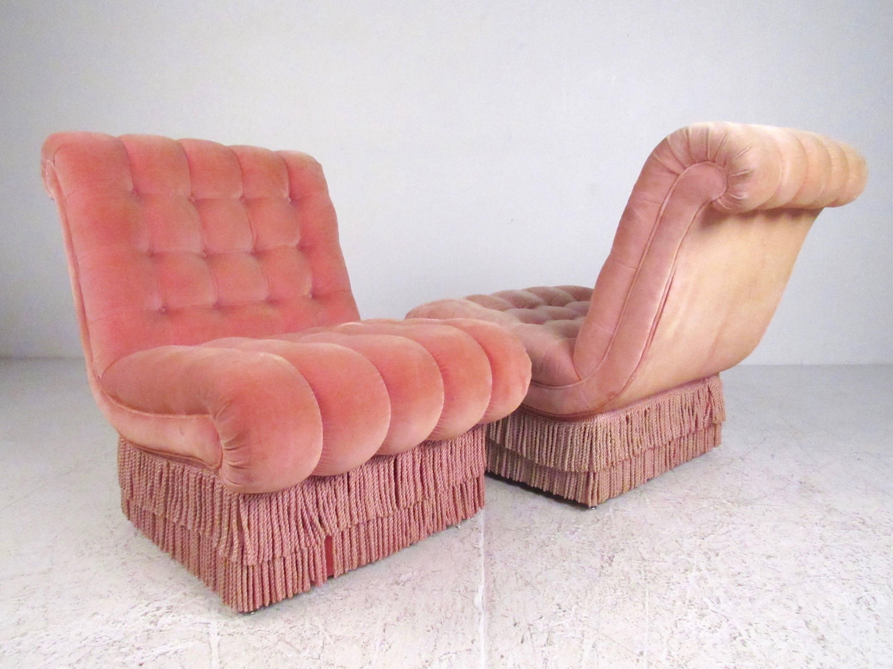 This unique pair of vintage modern slipper chairs feature shapely design with stylish tufting and comfortable upholstery. The boudoir style of the matching pair makes a memorable addition to any interior. Please confirm item location (NY or