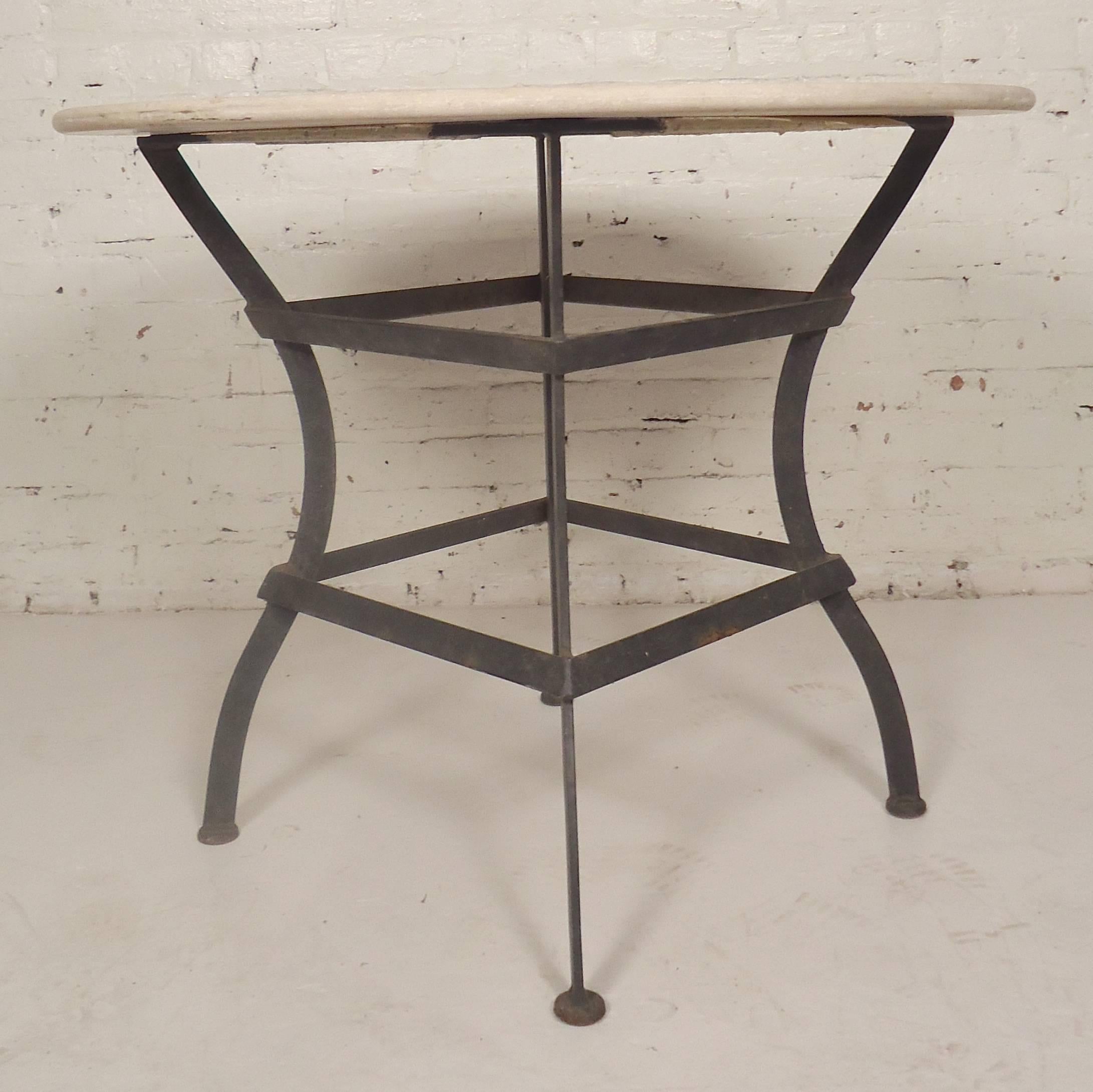 Vintage iron base table with thick stone top. Sturdy and strong with a clean look.

(Please confirm item location - NY or NJ - with dealer).
   