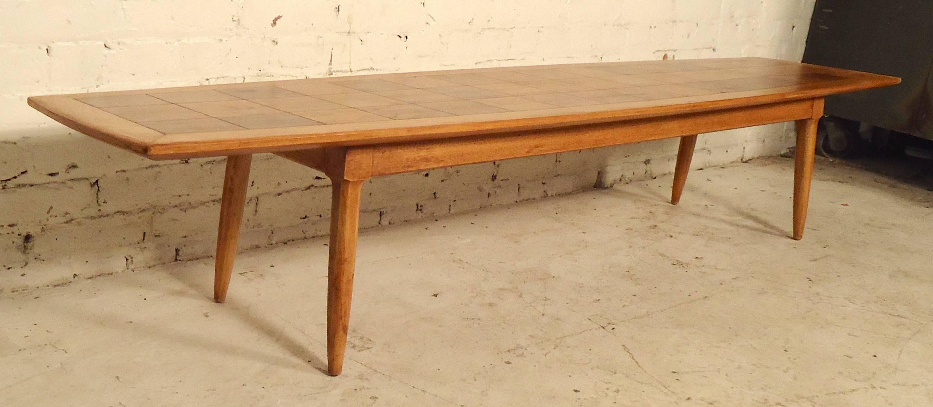 Beautiful Mid-Century Modern table by Tomlinson, with a blonde color grain and bird's-eye checkerboard top.

(Please confirm item location, NY or NJ, with dealer).
 