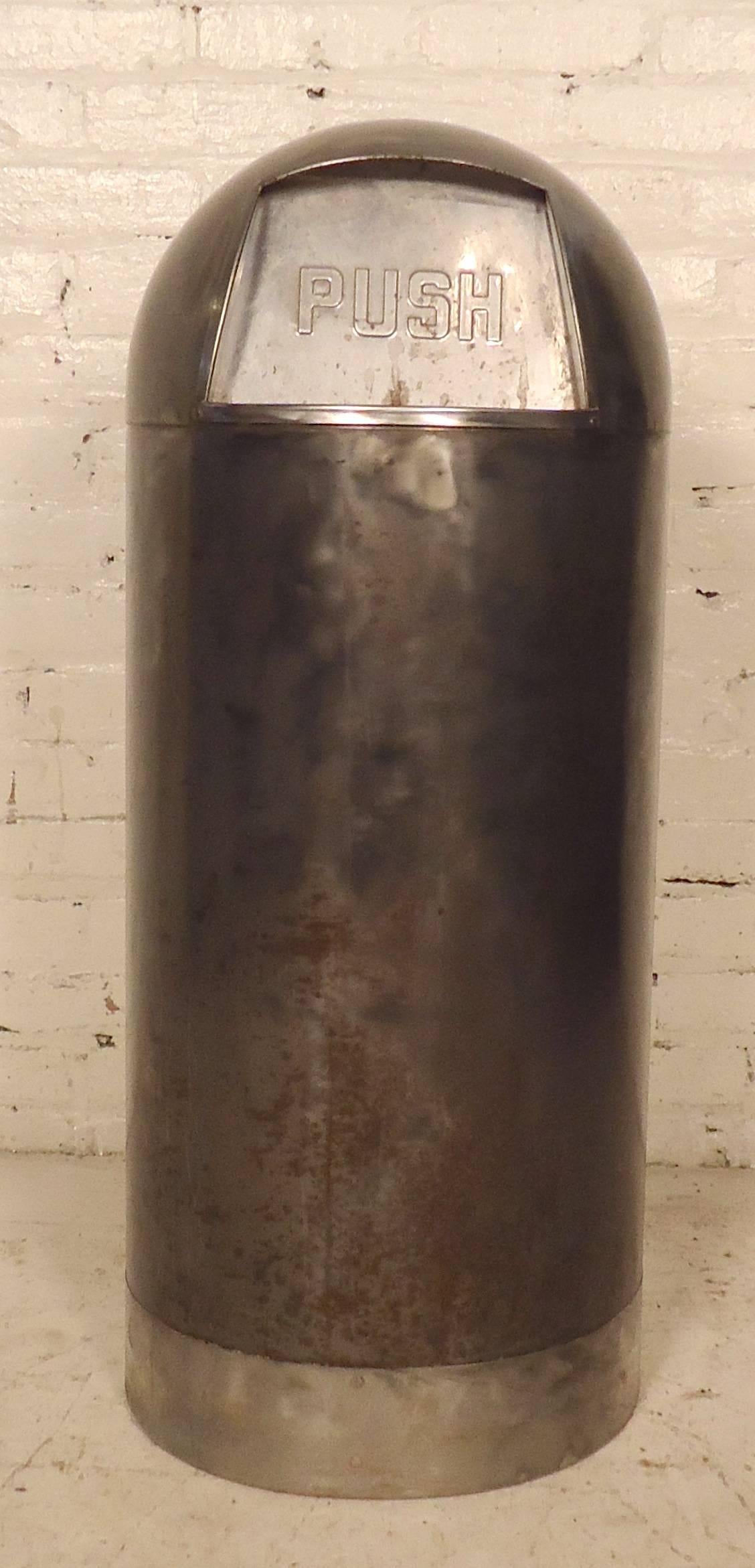 Metal trash can with dome top and "push" embossed on the lid. Comes with galvanized liner. Paint has been stripped and metal has been sanded and lacquered to give a bare metal style finish.

(Please confirm item location - NY or NJ -