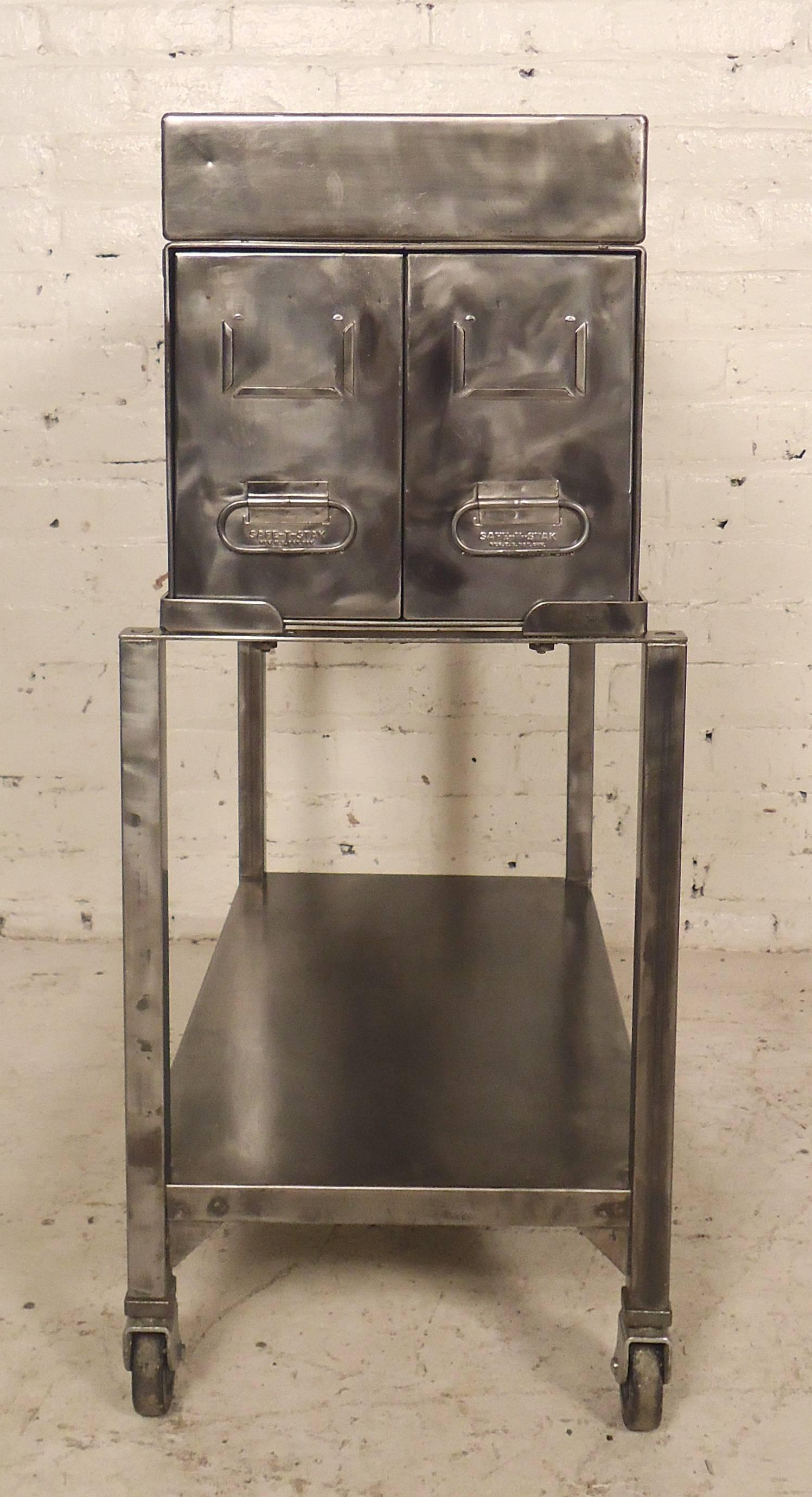 Vintage file cart on casters, refinished in a handsome Industrial style. Two card files that rest on the rolling cart. Makes a unique bar cart.

(Please confirm item location, NY or NJ, with dealer).
 