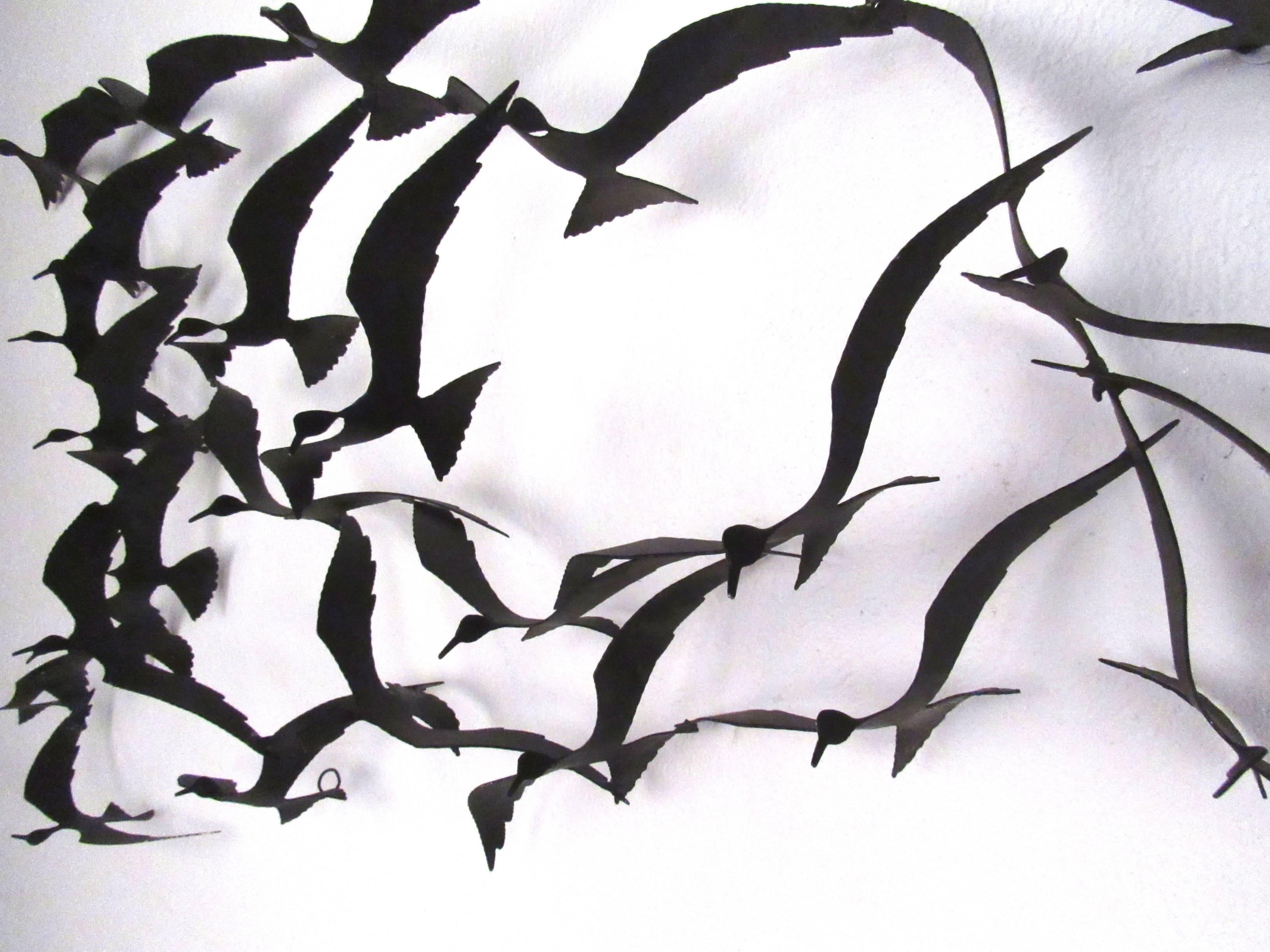 birds in flight wall sculpture