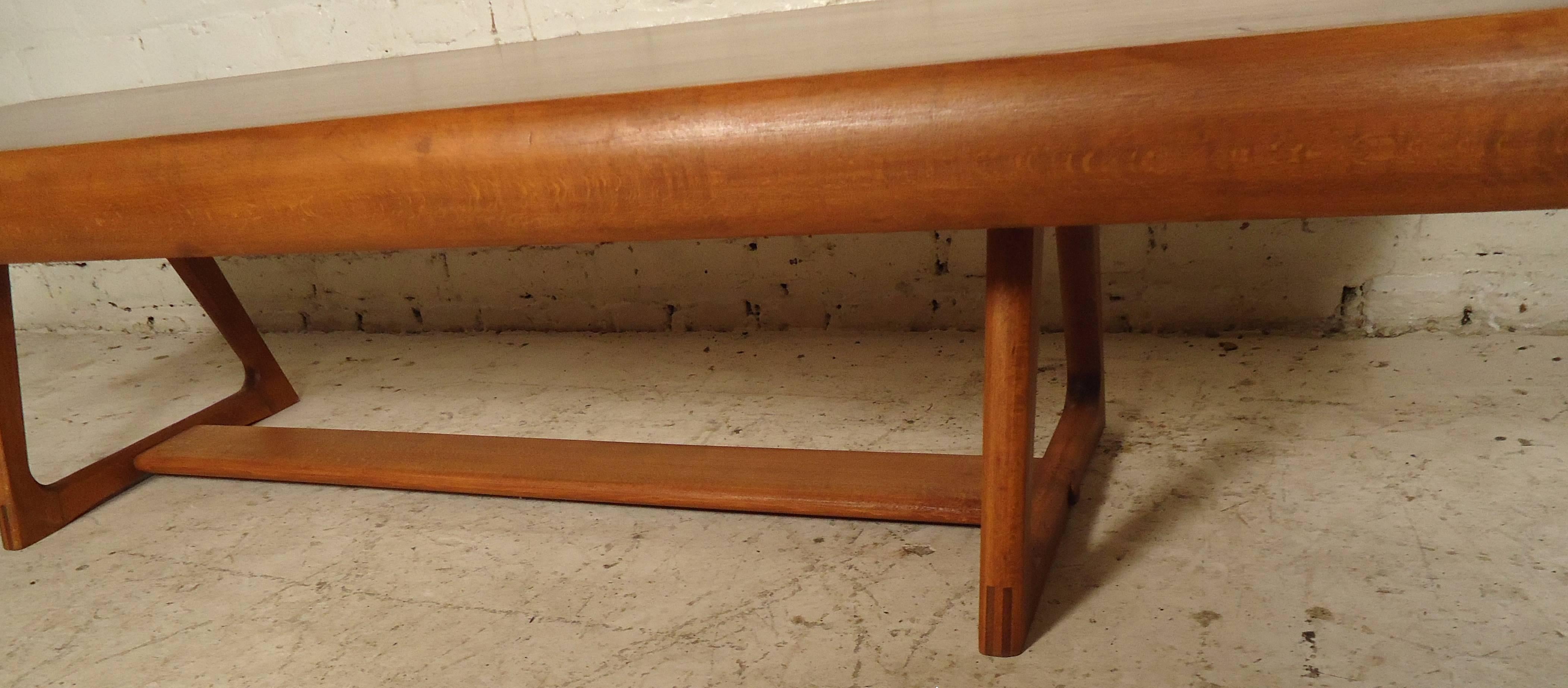 This beautiful vintage modern Yugoslavian coffee table is very rare.
The rich wood grain and odd shaped legs makes this table one of a kind.

(Please confirm item location - NY or NJ - with dealer).