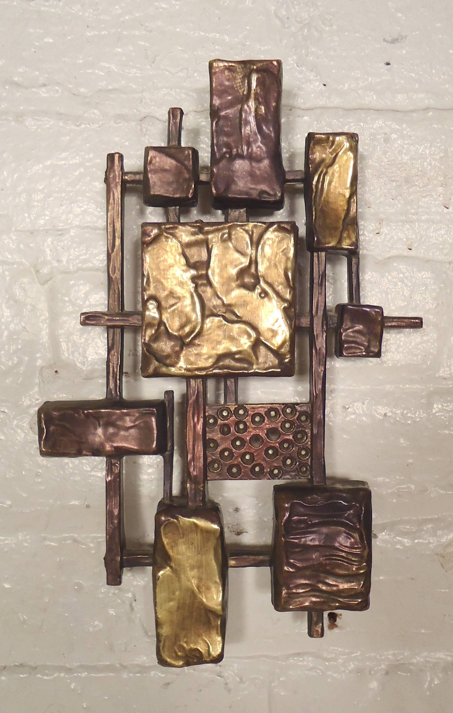 Pair of brass color Mid-Century Brutalist motif wall art. Can be hung horizontal or vertical.

(Please confirm item location - NY or NJ - with dealer).
 