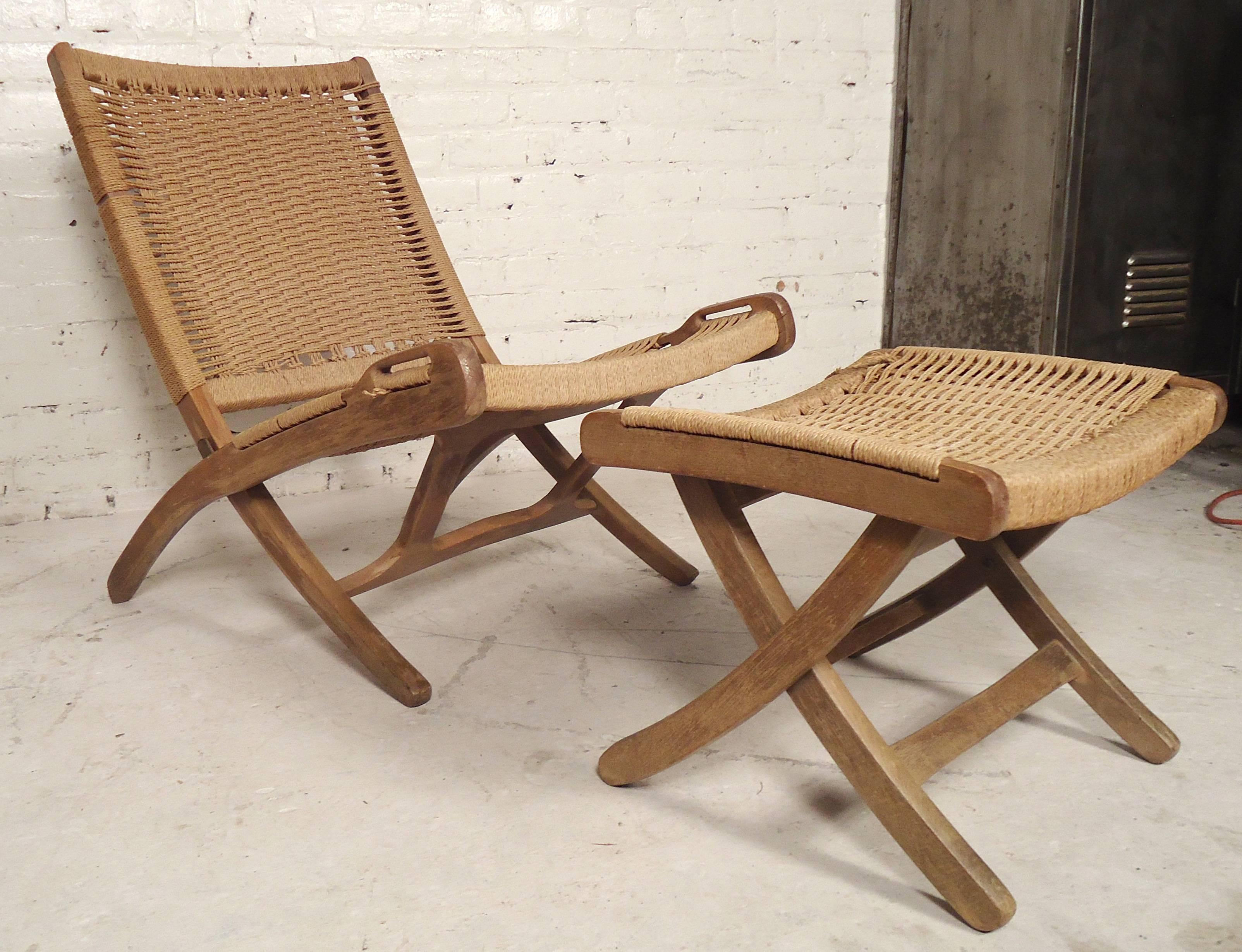 Classic Hans Wegner style woven rope chair with ottoman. Comfortable low seating for indoors or patio use with easy folding.

(Please confirm item location NY or NJ with dealer).
       