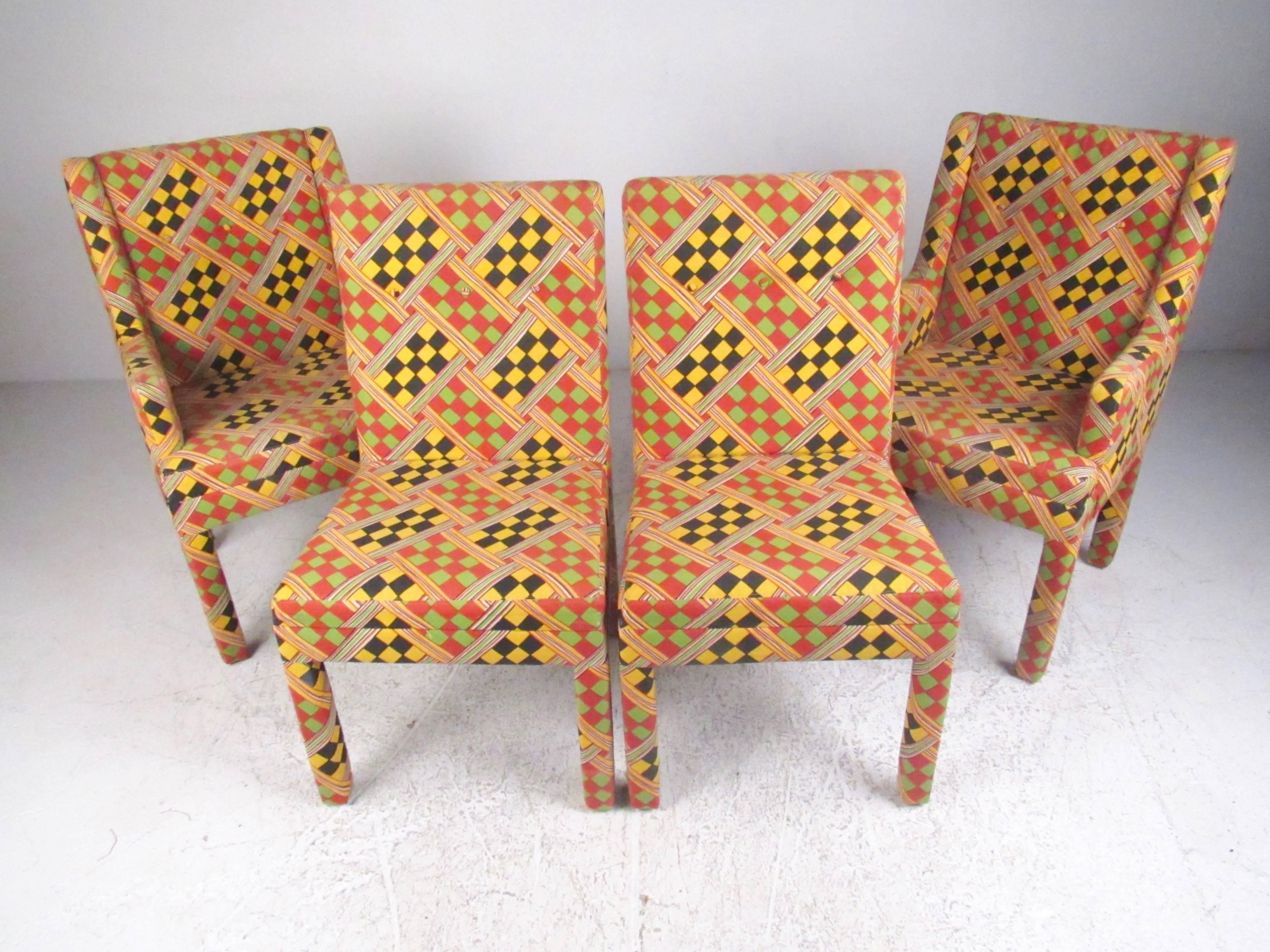 This set of four stylish vintage modern dining chairs features bright multi-patterned upholstery, sturdy construction, and unique Parsons style design. Comfortable matching set includes two arm chairs (24 inches wide) and two side chairs (20 inches