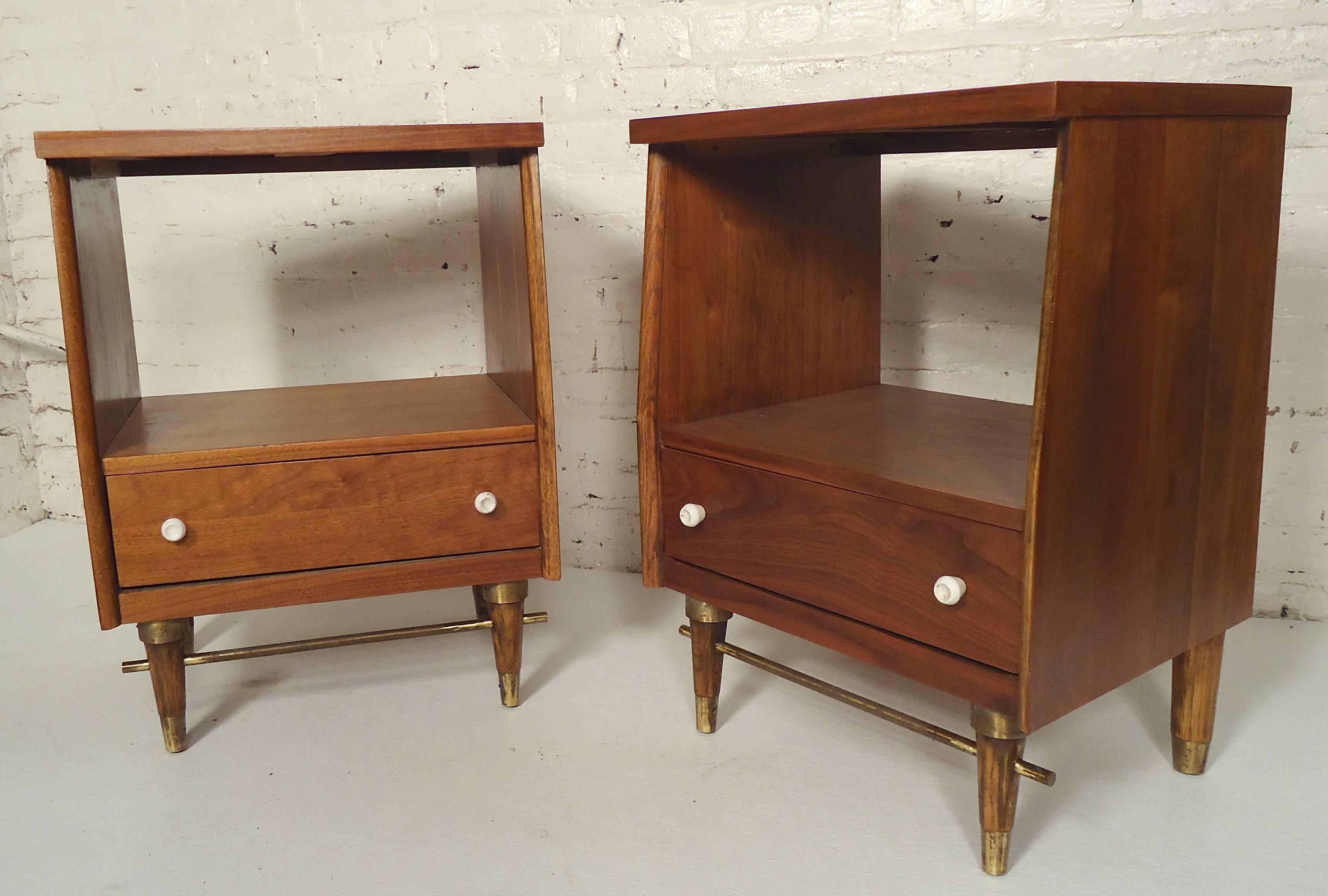 Walnut nightstands with open cabinet and drawer storage. Accented by white glass pulls and brass trim.

(Please confirm item location - NY or NJ - with dealer).
          