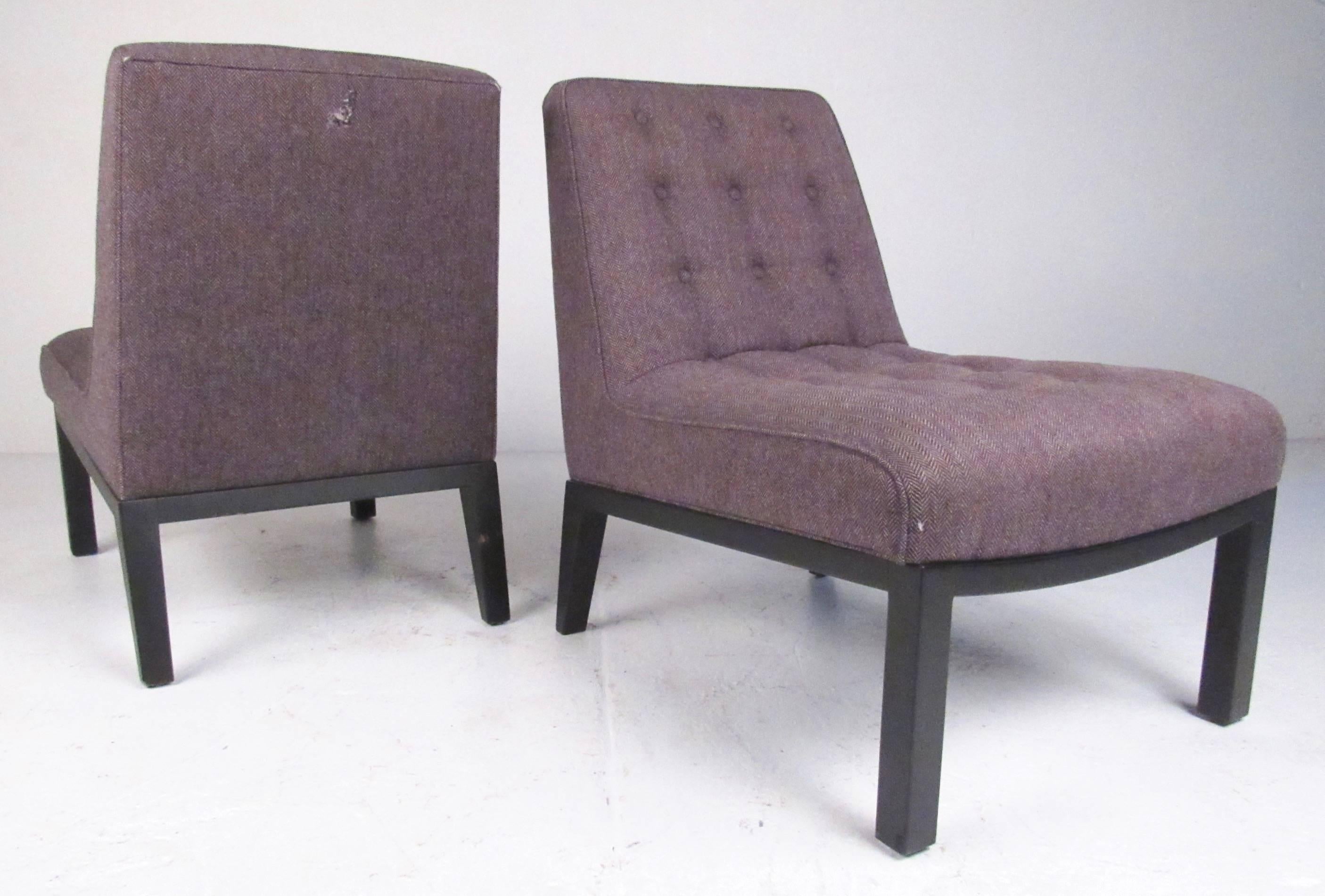 This comfortable pair of Mid-Century slipper chairs feature the iconic design of Edward Wormley for Dunbar. Vintage fabric on simple modern frames make an impressive addition to home or office seating areas. 
Please confirm item location (NY or NJ).