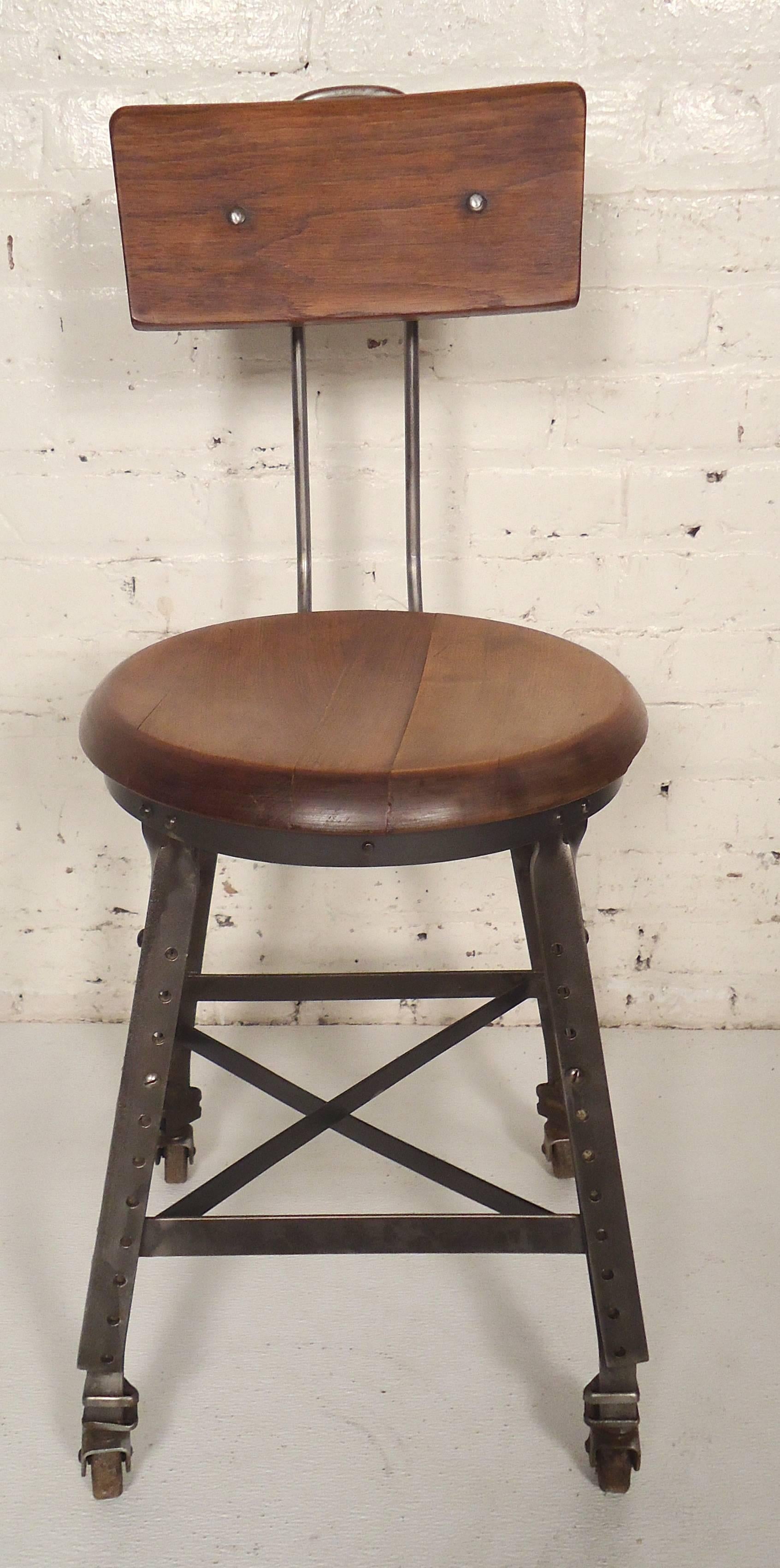 Single Industrial style rolling stool with wood seat and back. Unique size with Toledo Company look.

(Please confirm item location NY or NJ with dealer).
   
