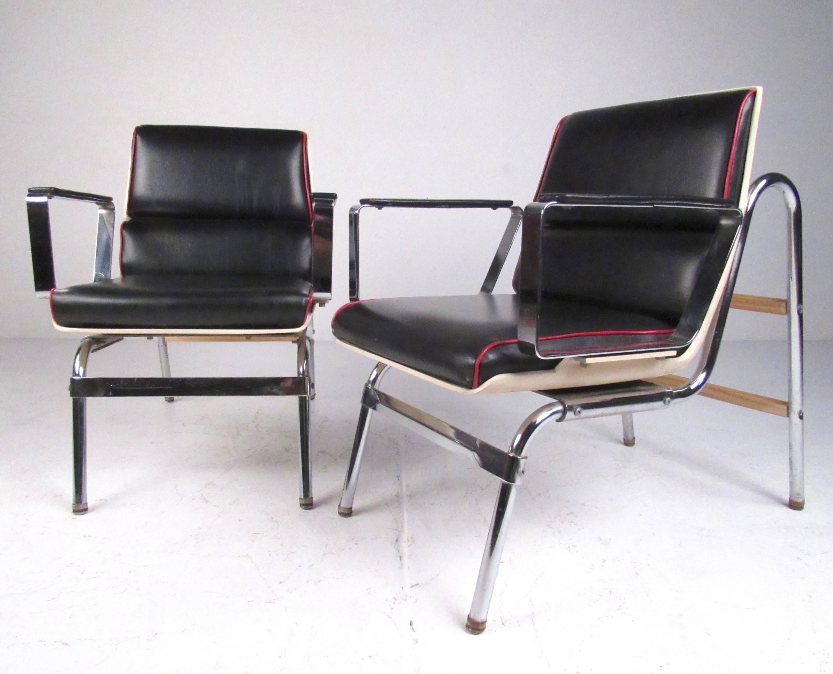 This unique pair of retro modern arm chairs features striking Mid-Century design without sacrificing comfort. Stylish vintage design by Belmont makes these eye-catching black vinyl and chrome lounge chairs the perfect addition to home or office.