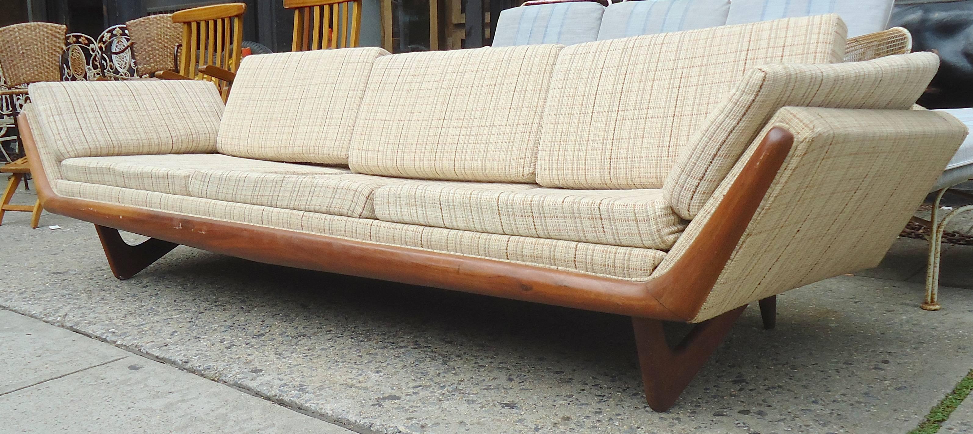 Long Mid-Century sofa by Adrian Pearsall with walnut trim. Great 1960s form and comfort.

(Please confirm item location-NY or NJ with dealer).
 