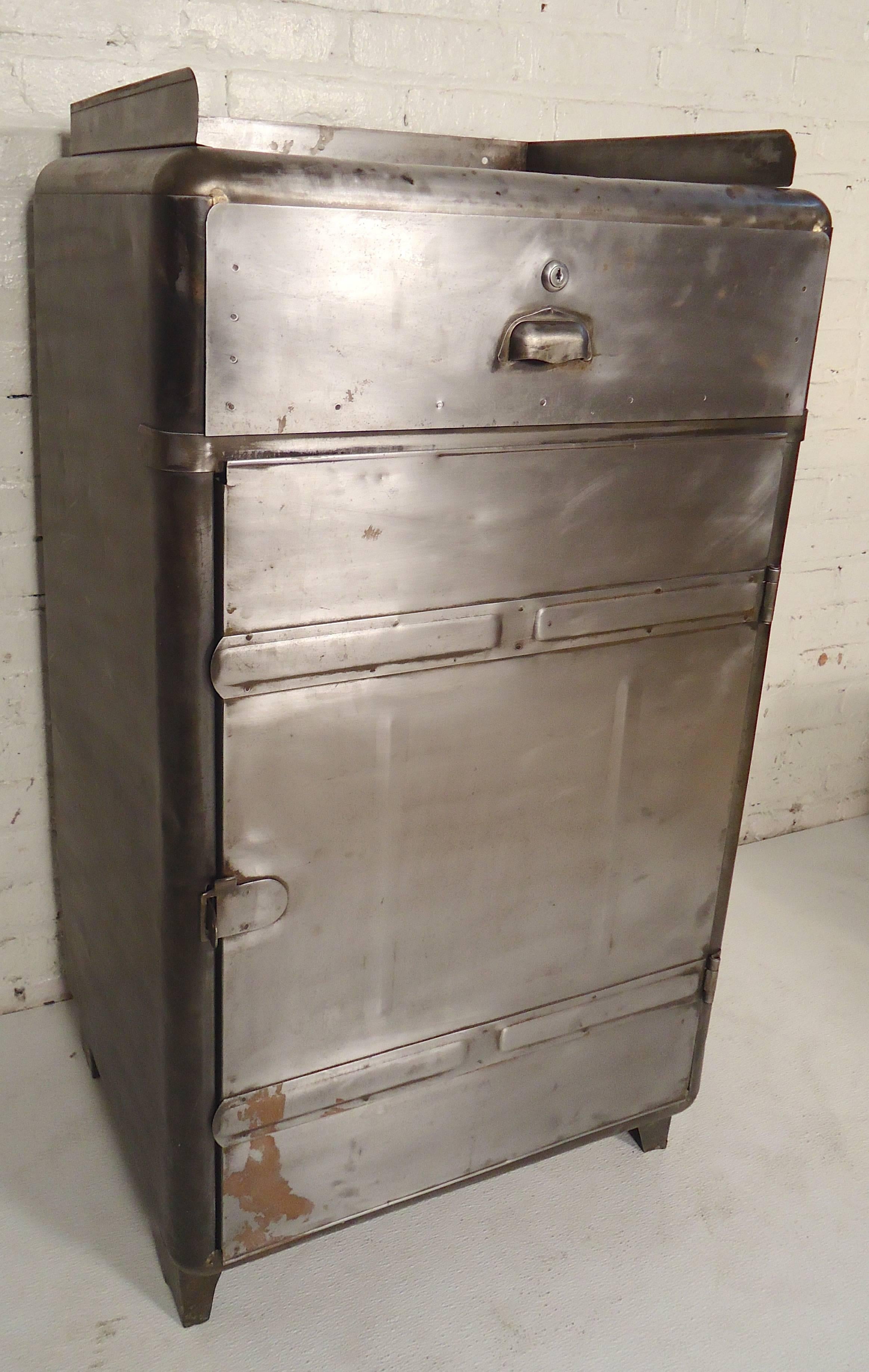 This Industrial metal cabinet makes a great bathroom storage cabinet. It has been stripped, sanded and given a bare metal style finish.

(Please confirm item location - NY or NJ - with dealer).
 