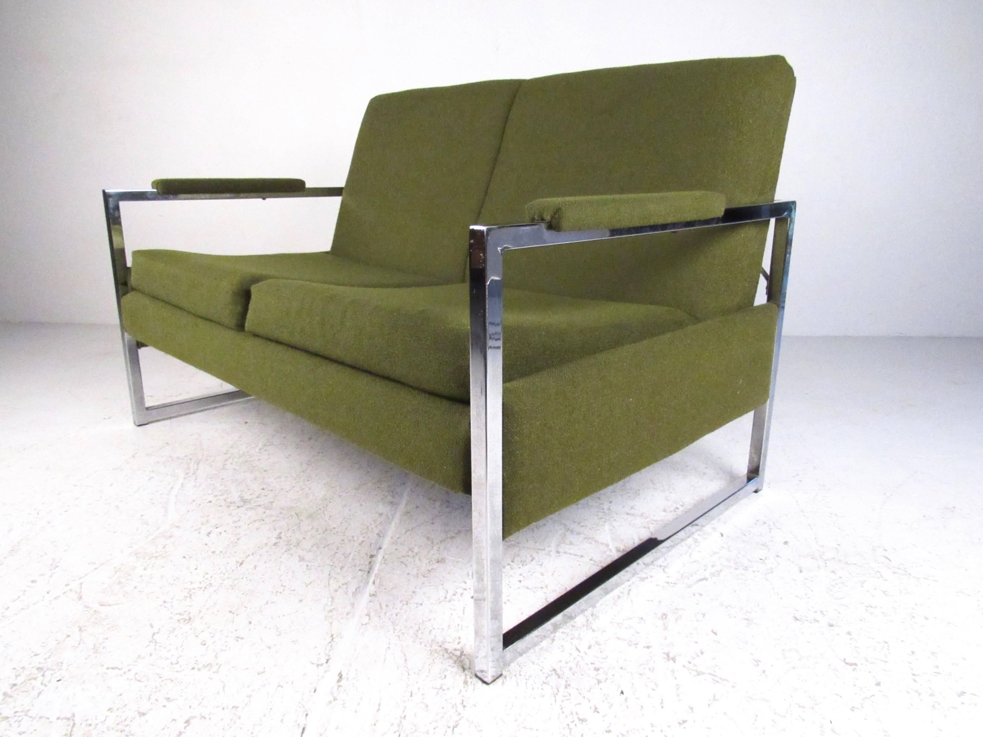 This stylish vintage love seat feature chrome finish frames, comfortable vintage upholstery, and matching padded armrests. Ideal two-seat sofa in the style of Milo Baughman for home or office, please confirm item location (NY or NJ).